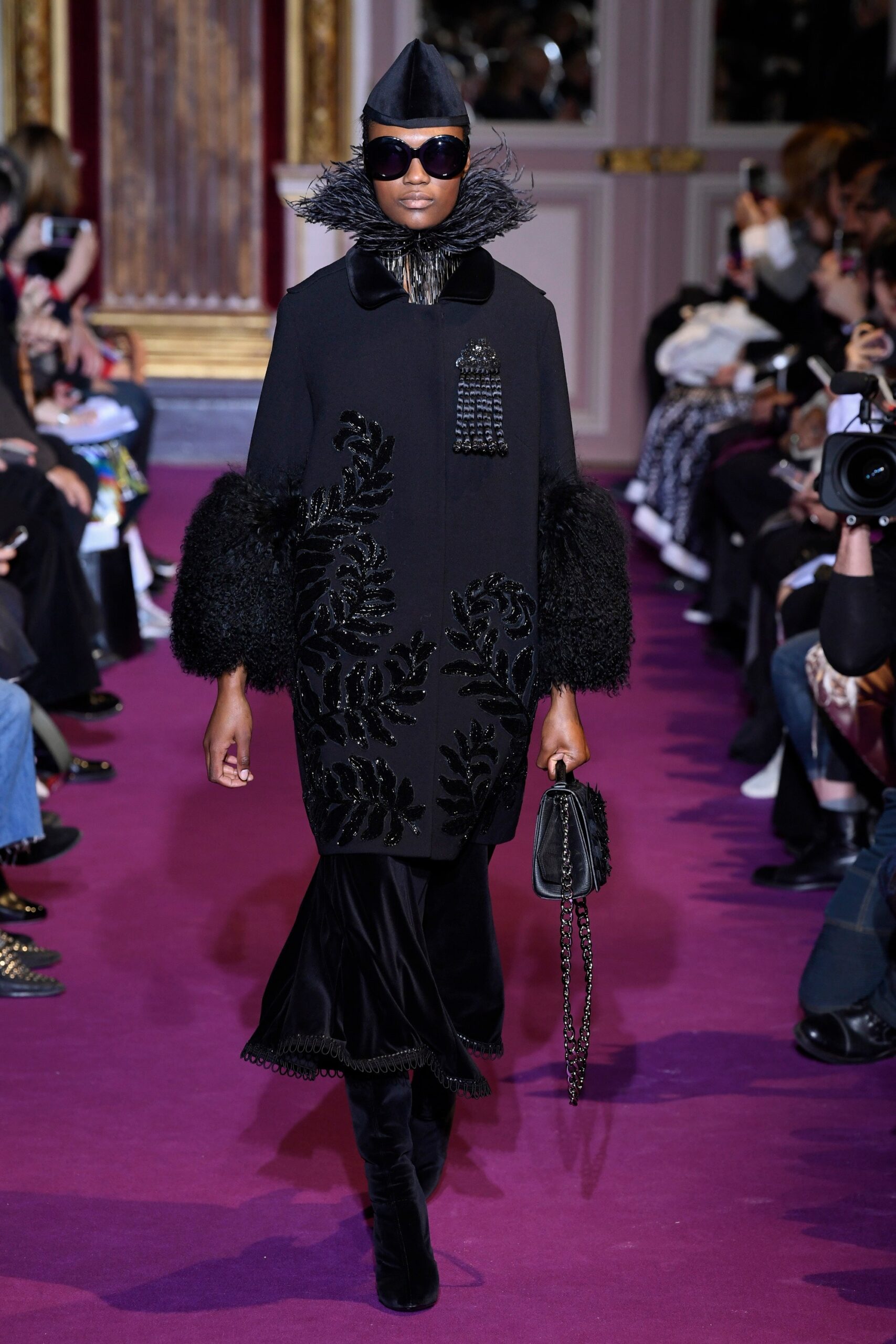 black wool coat with embroidered details