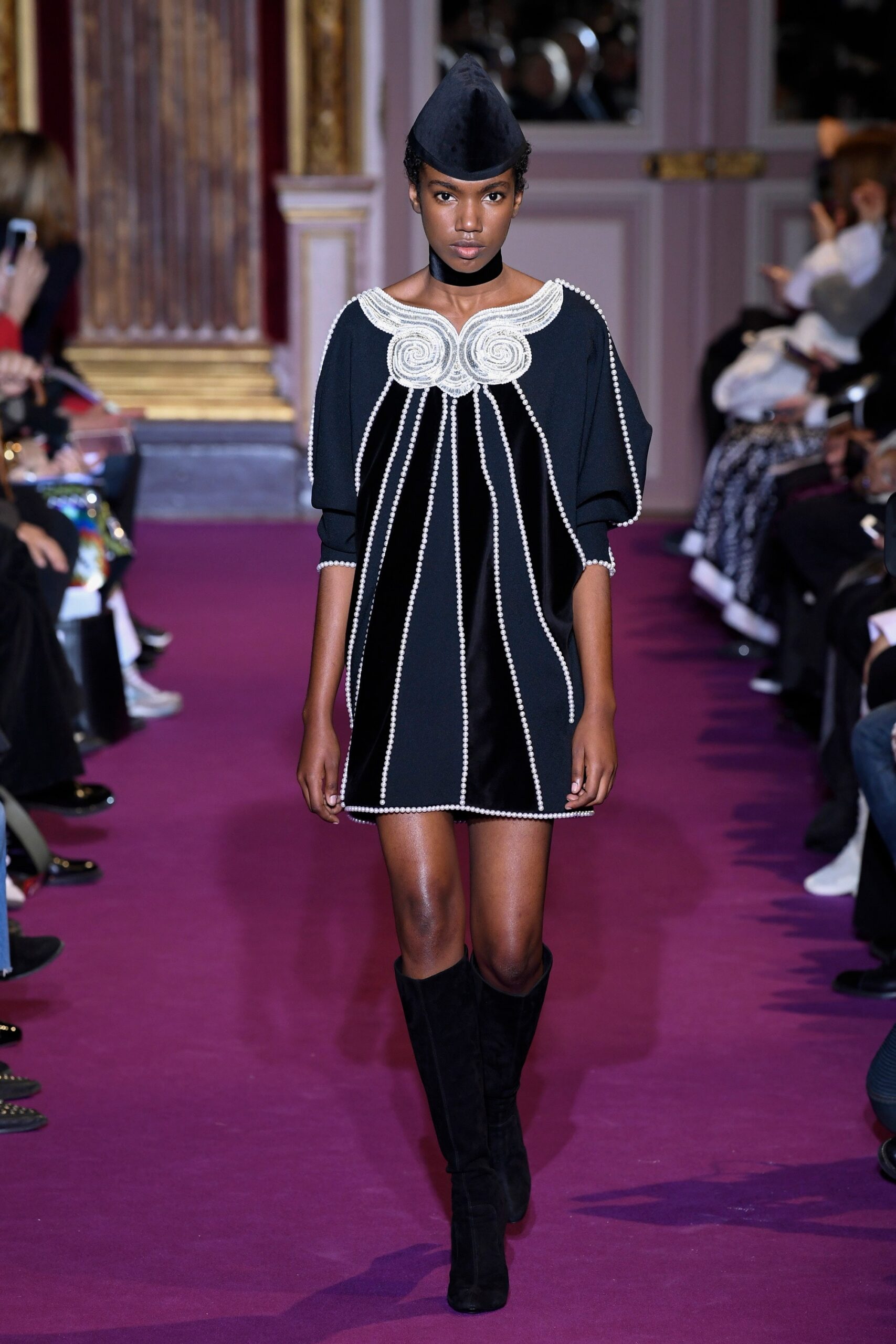 black fitted mini dress with boots