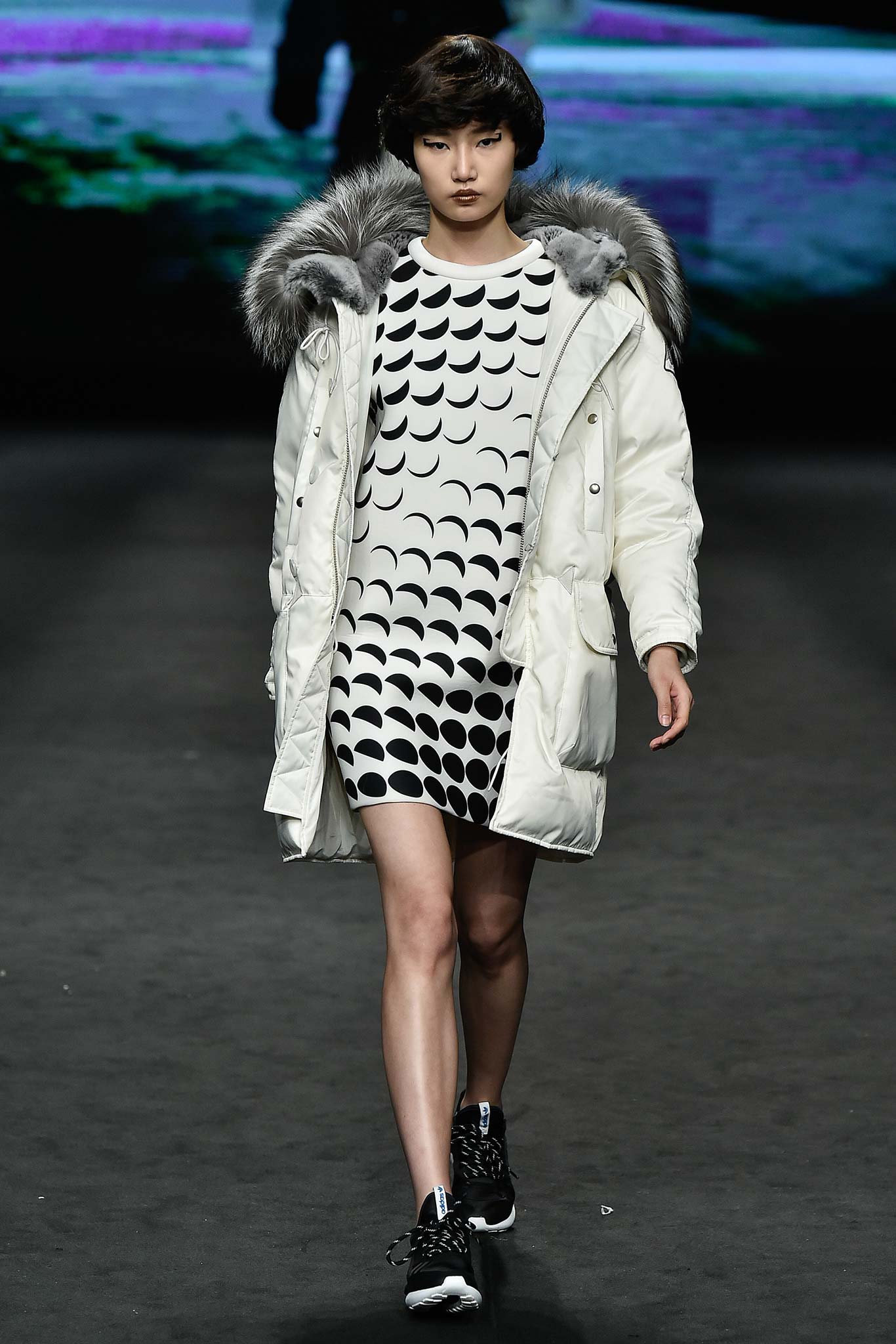 white faux-fur coat with printed dress