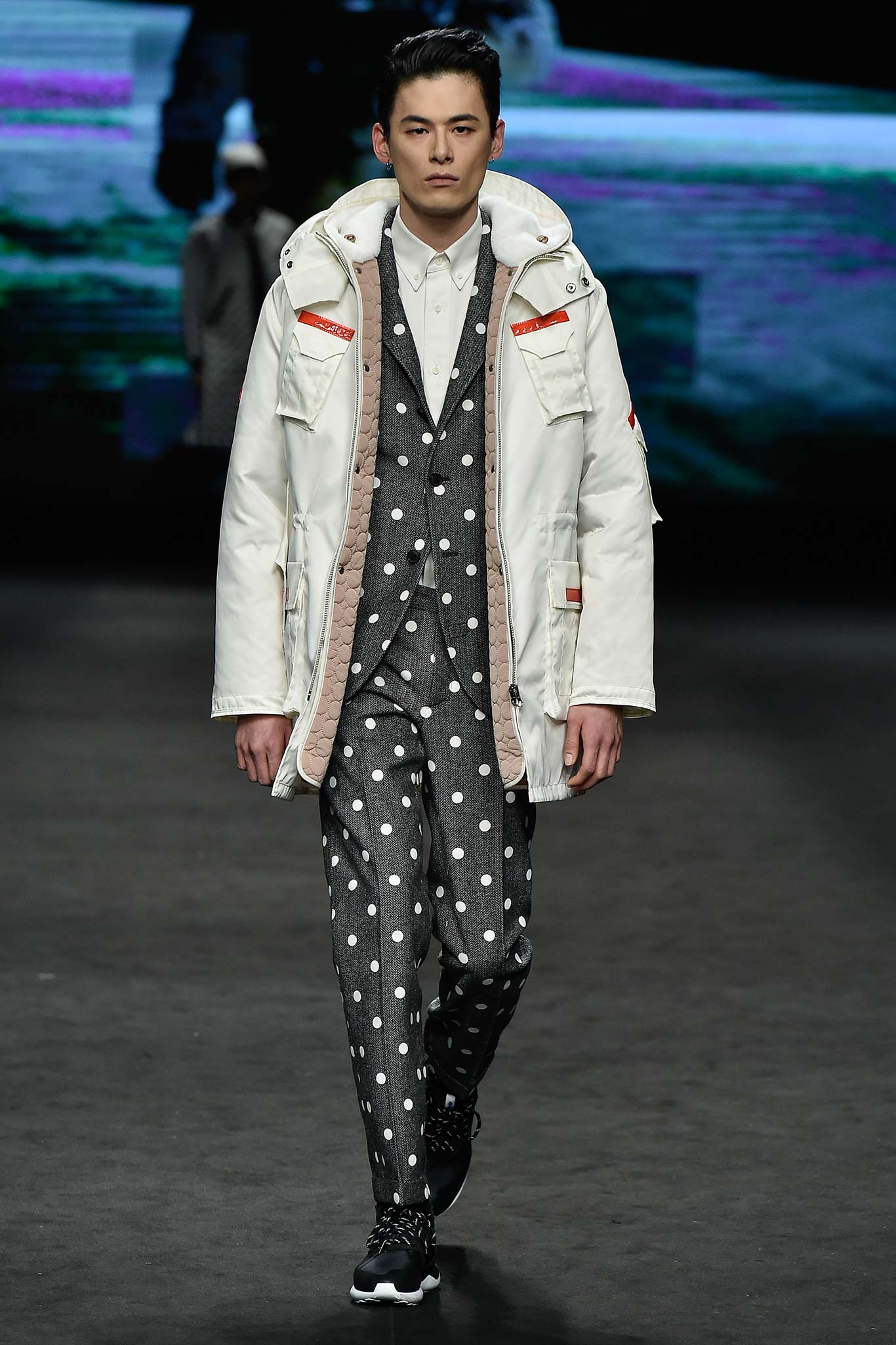 white parka with gray suit