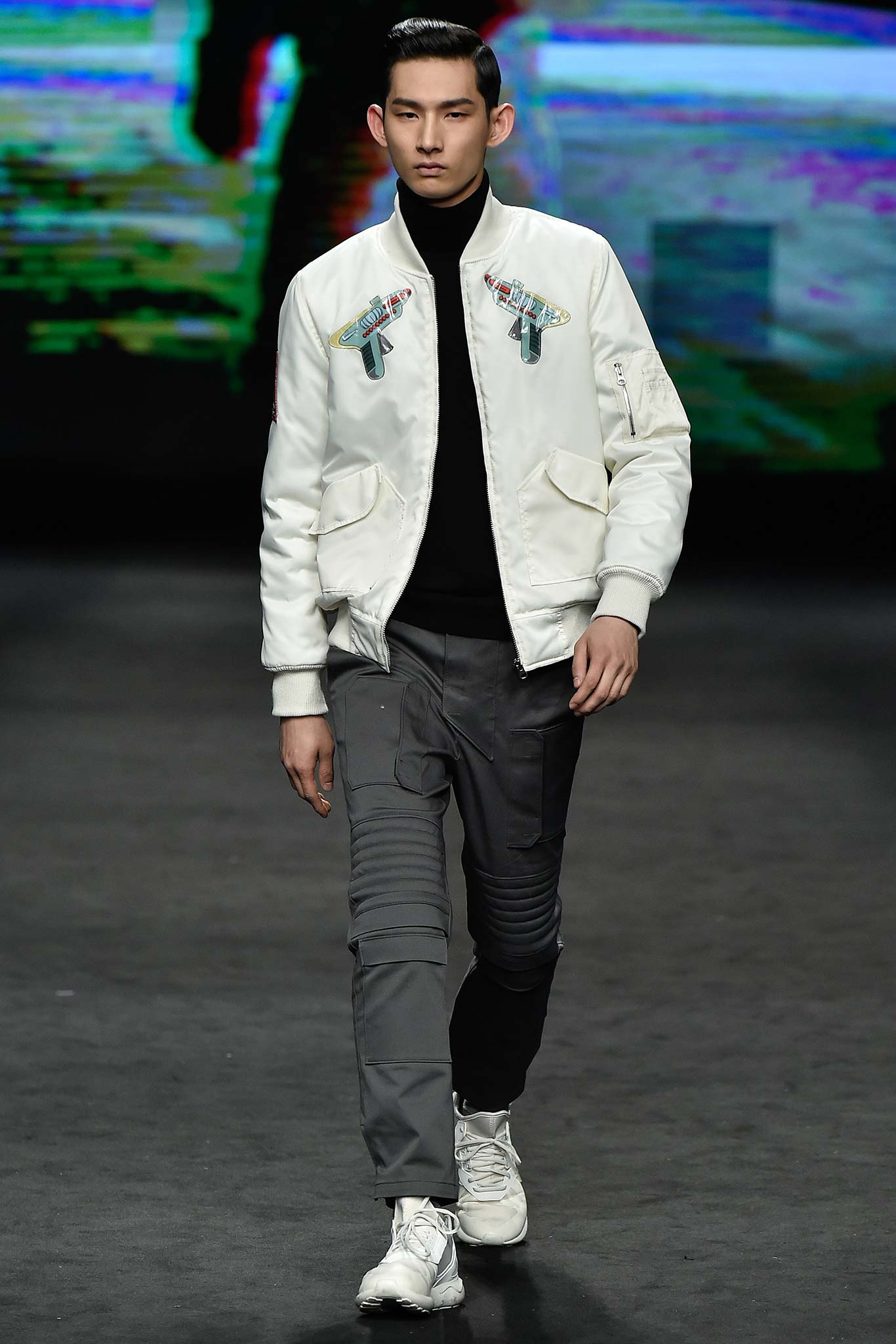 white embroidered jacket with black turtleneck