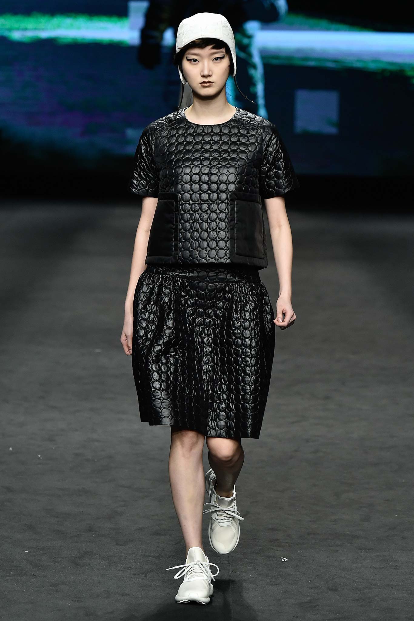 black leather short-sleeve collared fitted textured top