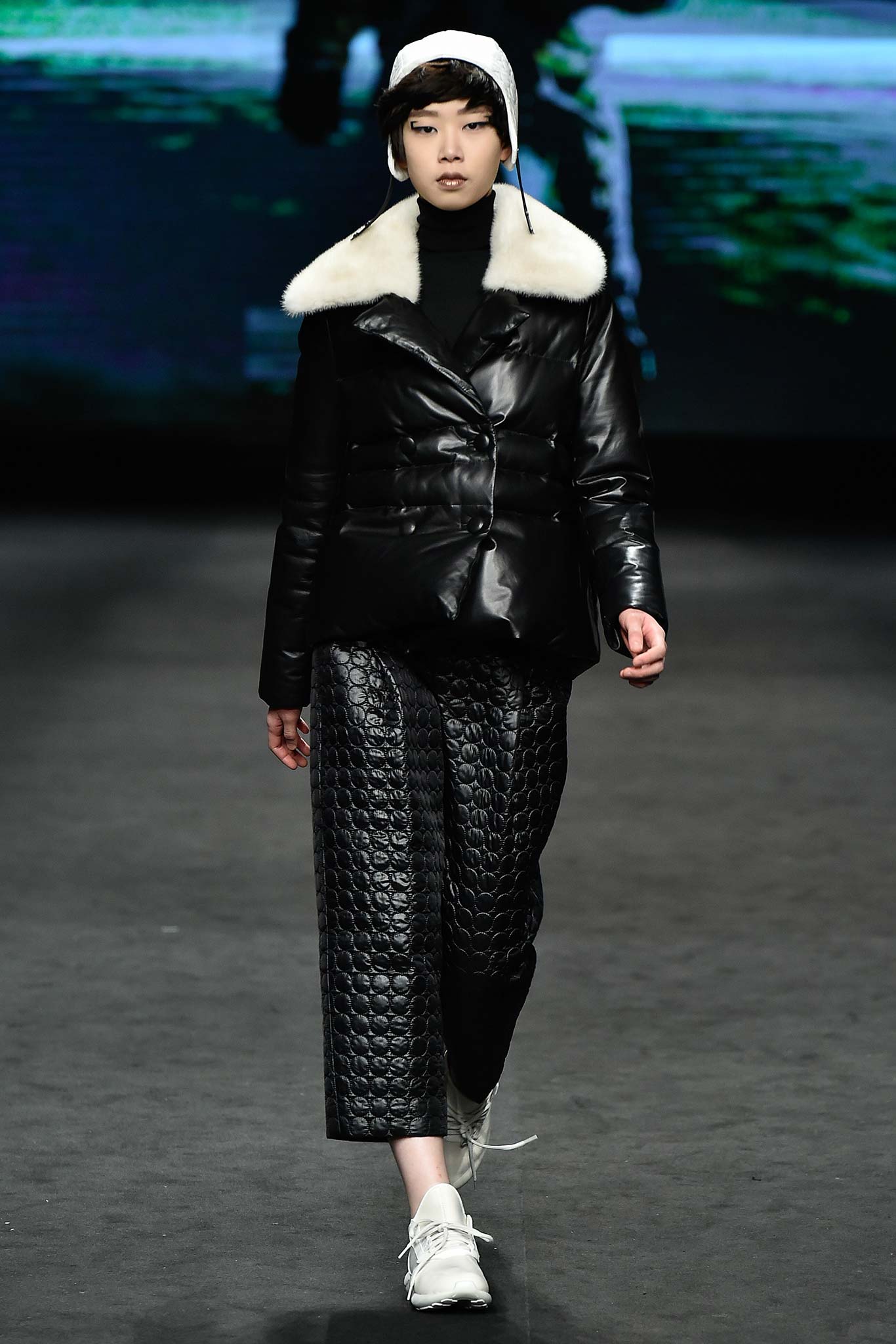 black leather jacket with quilted pants