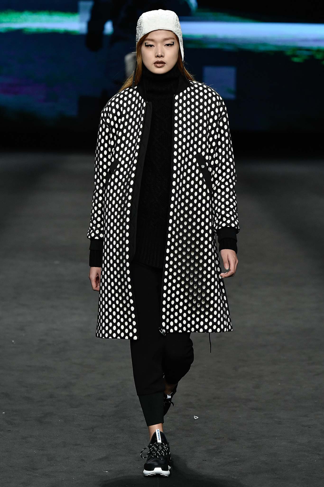 black and white polka-dot coat