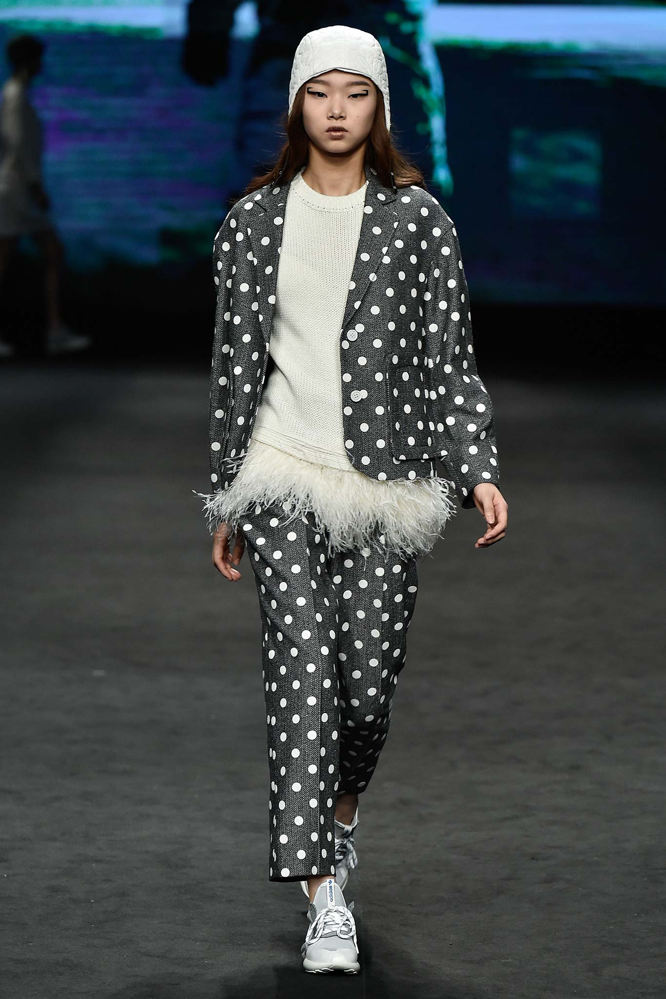 gray polka-dot jacket with white sweater