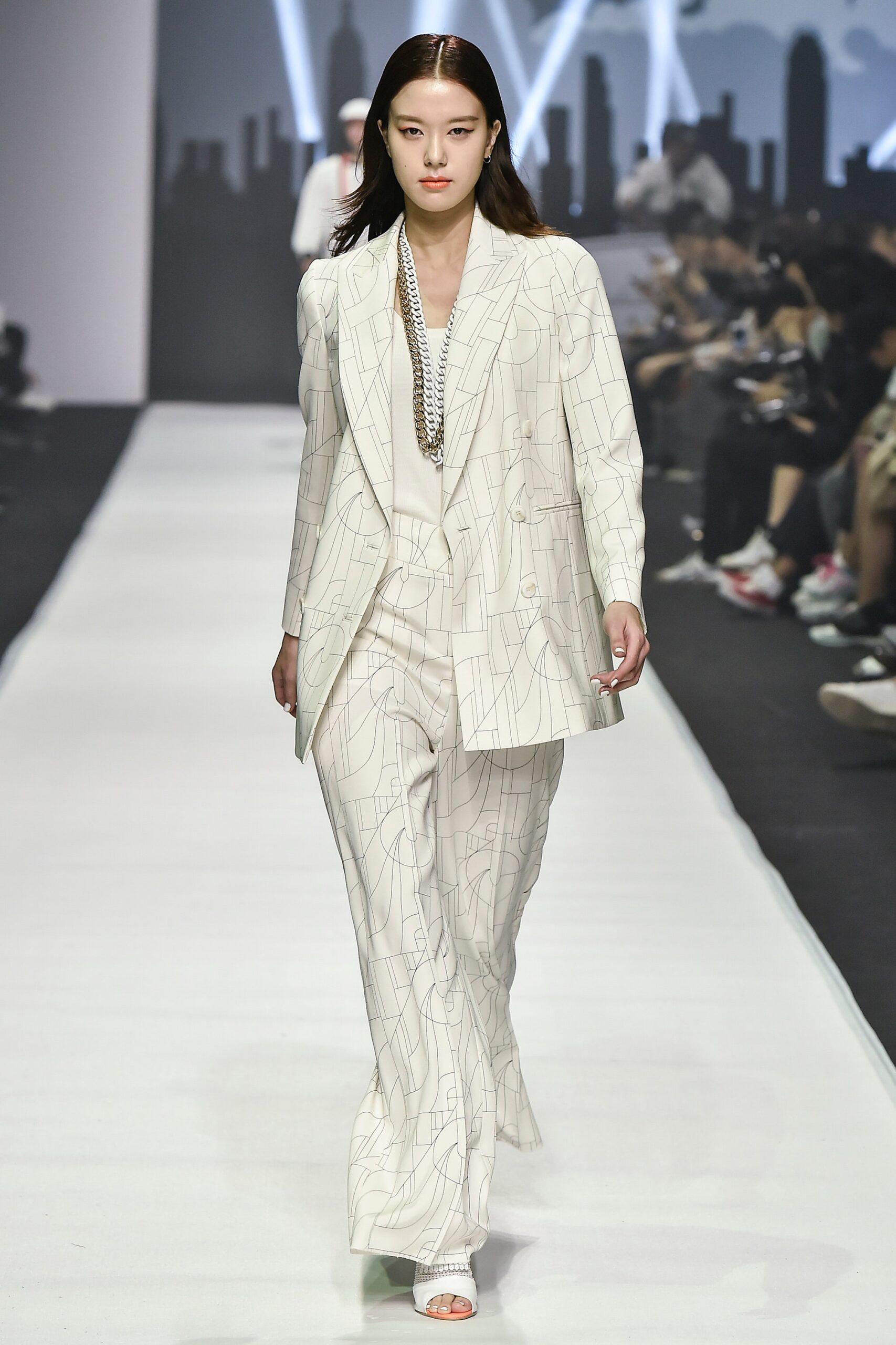 white tailored suit with printed pants