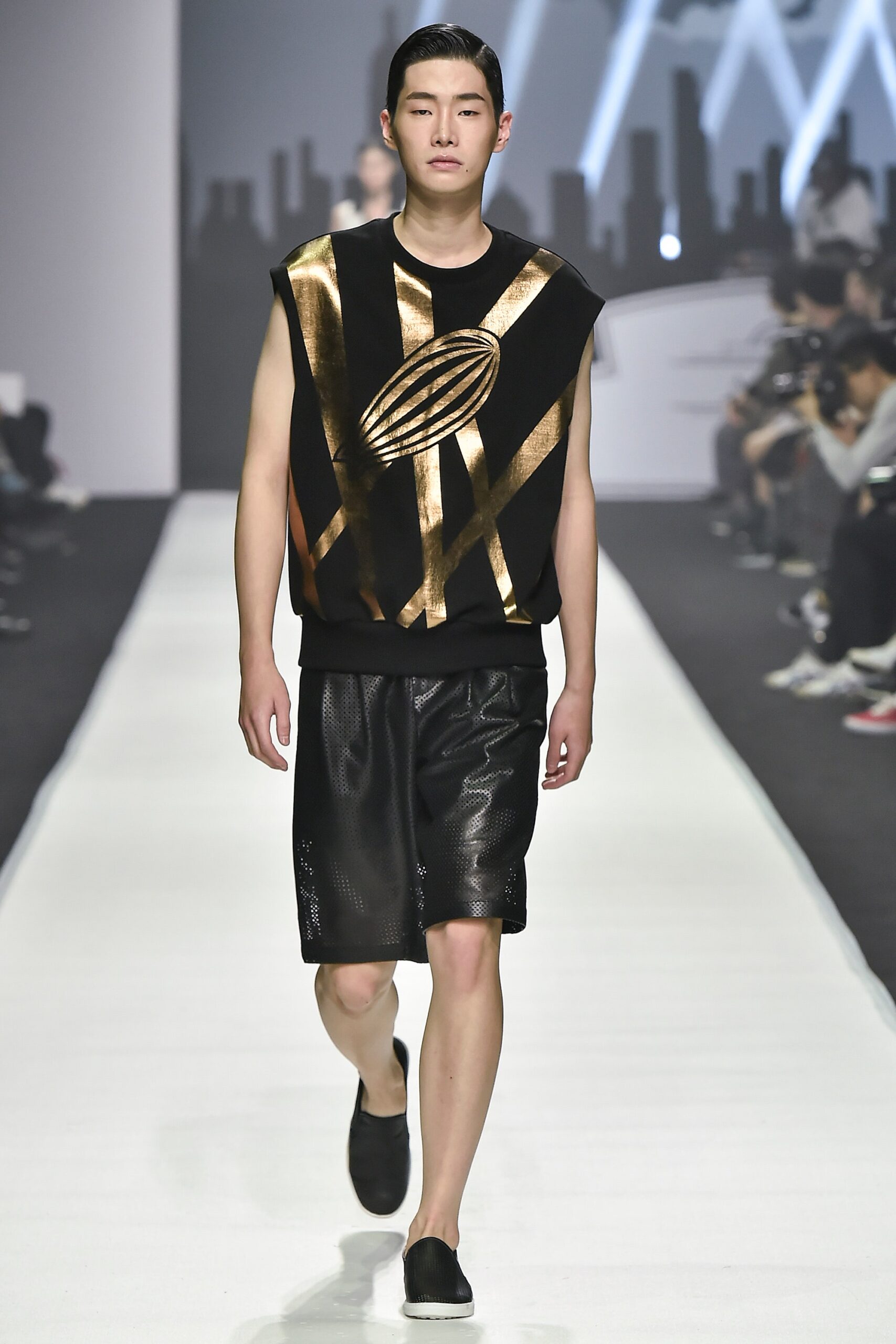 black and gold sleeveless top with shorts