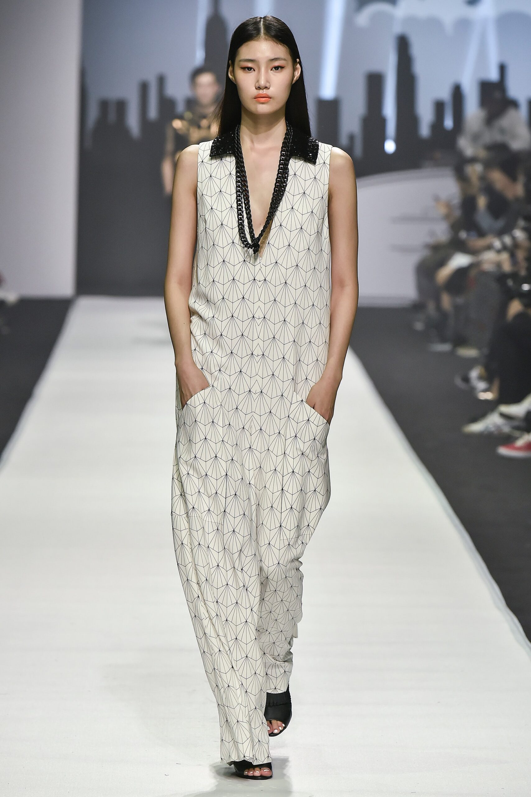 white printed sleeveless jumpsuit