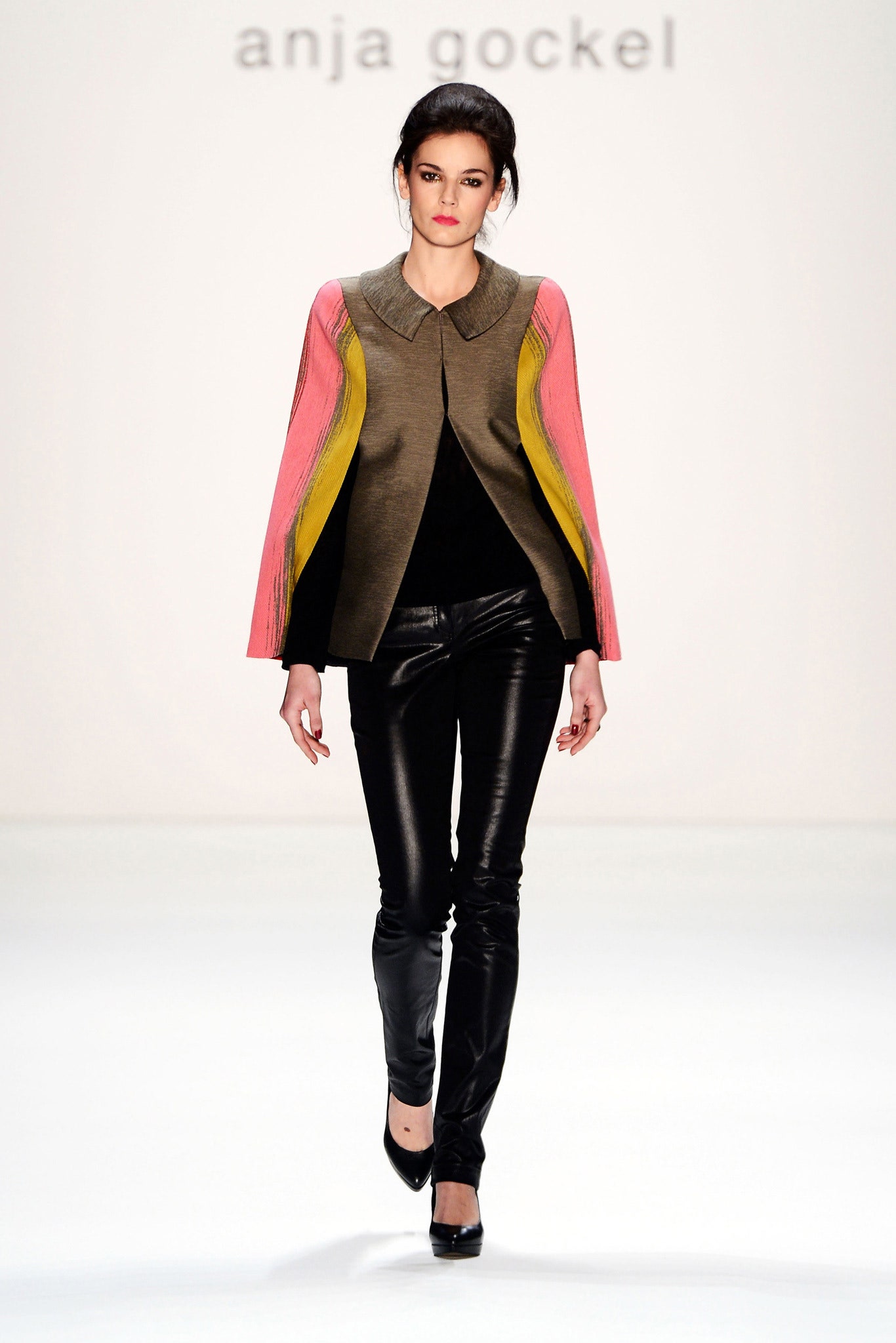 gray color-blocked cape with leather pants