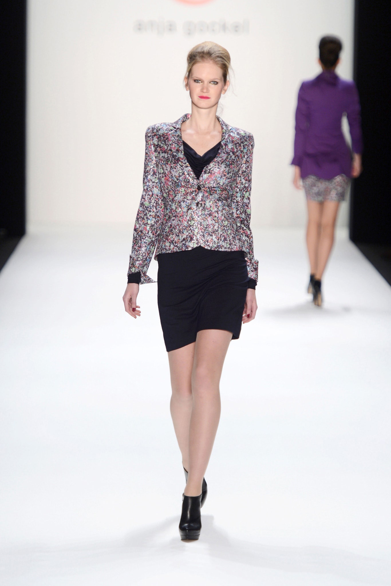 multi-colored tailored blazer and black fitted dress