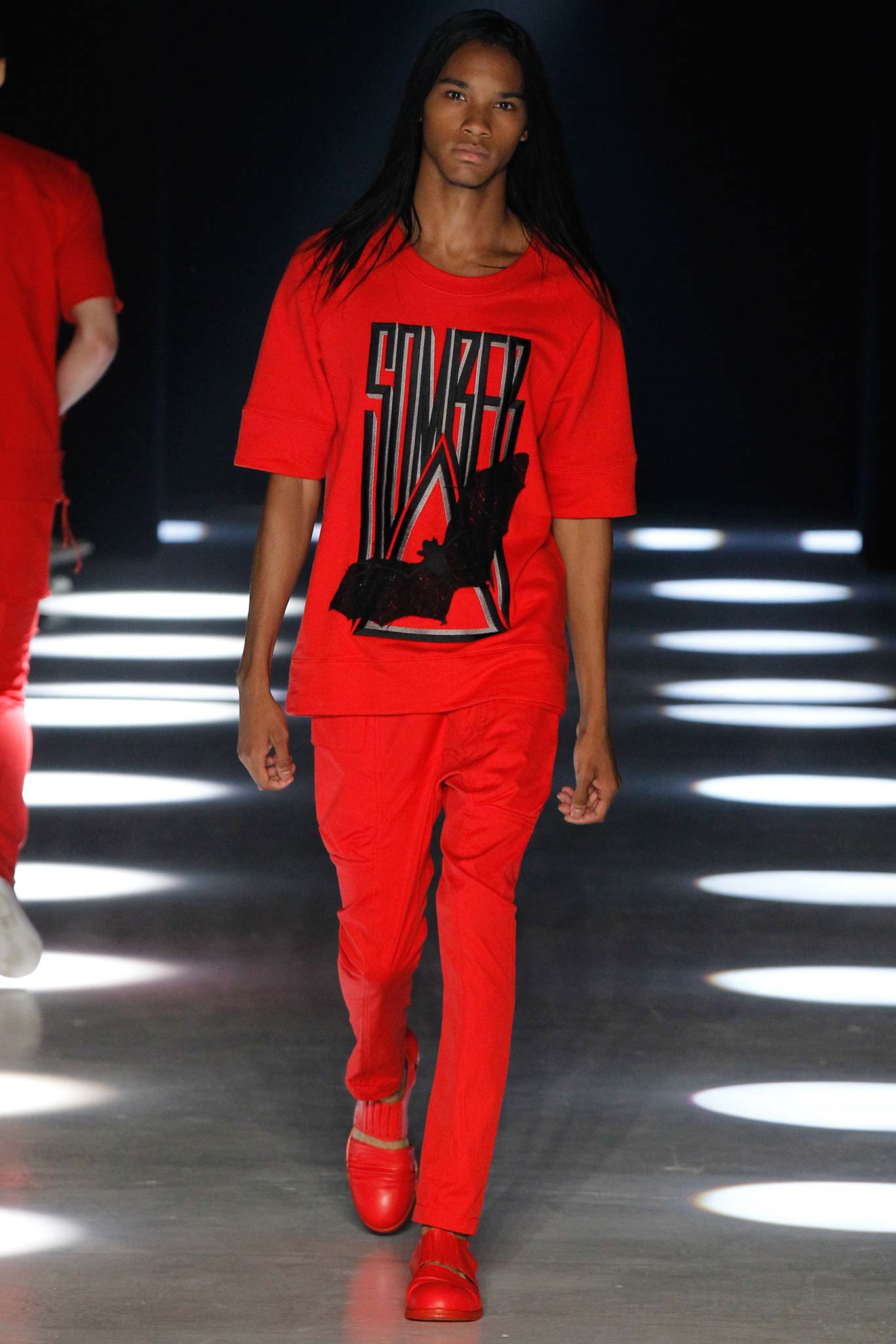 red relaxed t-shirt and slim pants