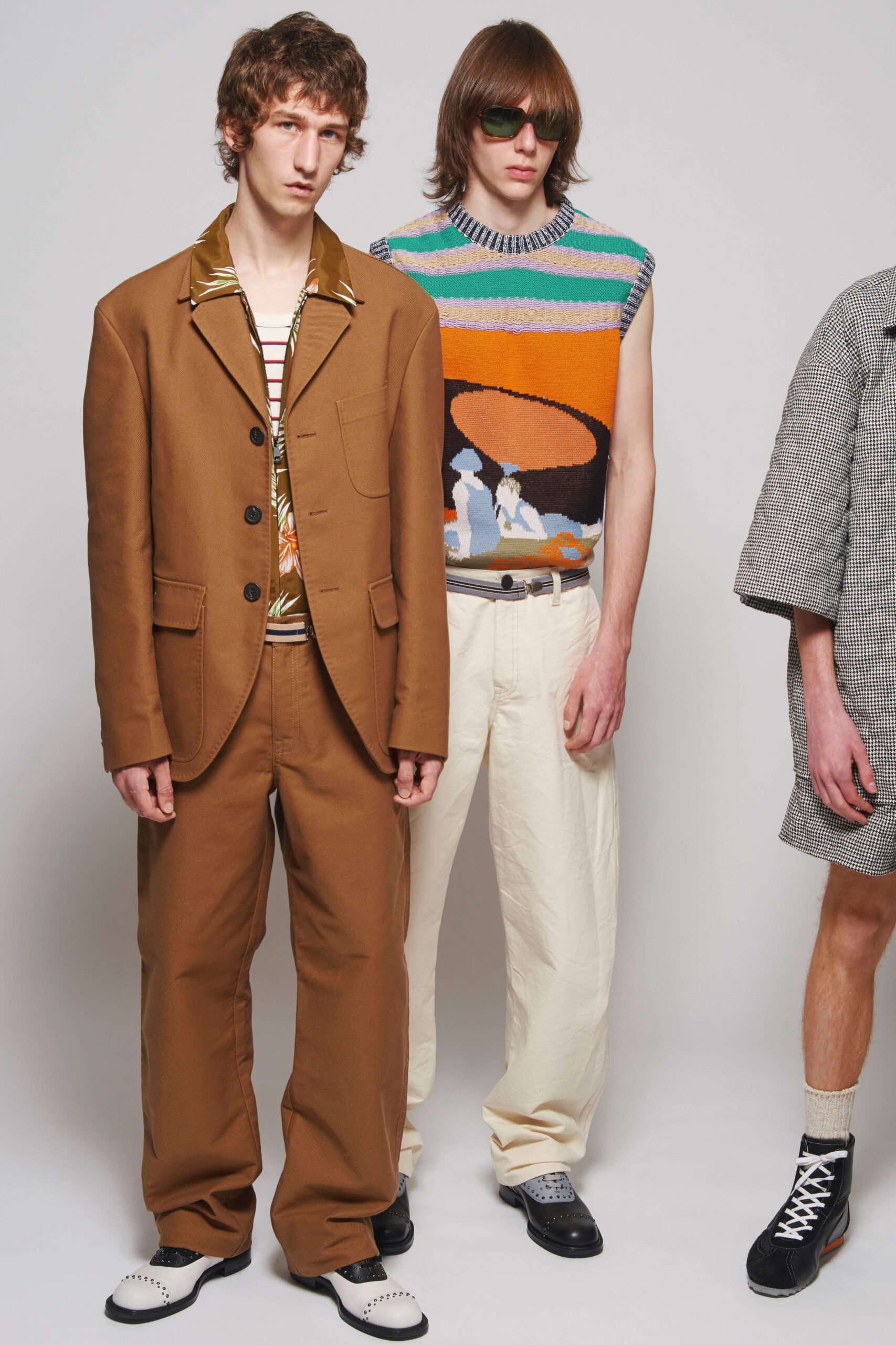 brown suit with multi-colored top