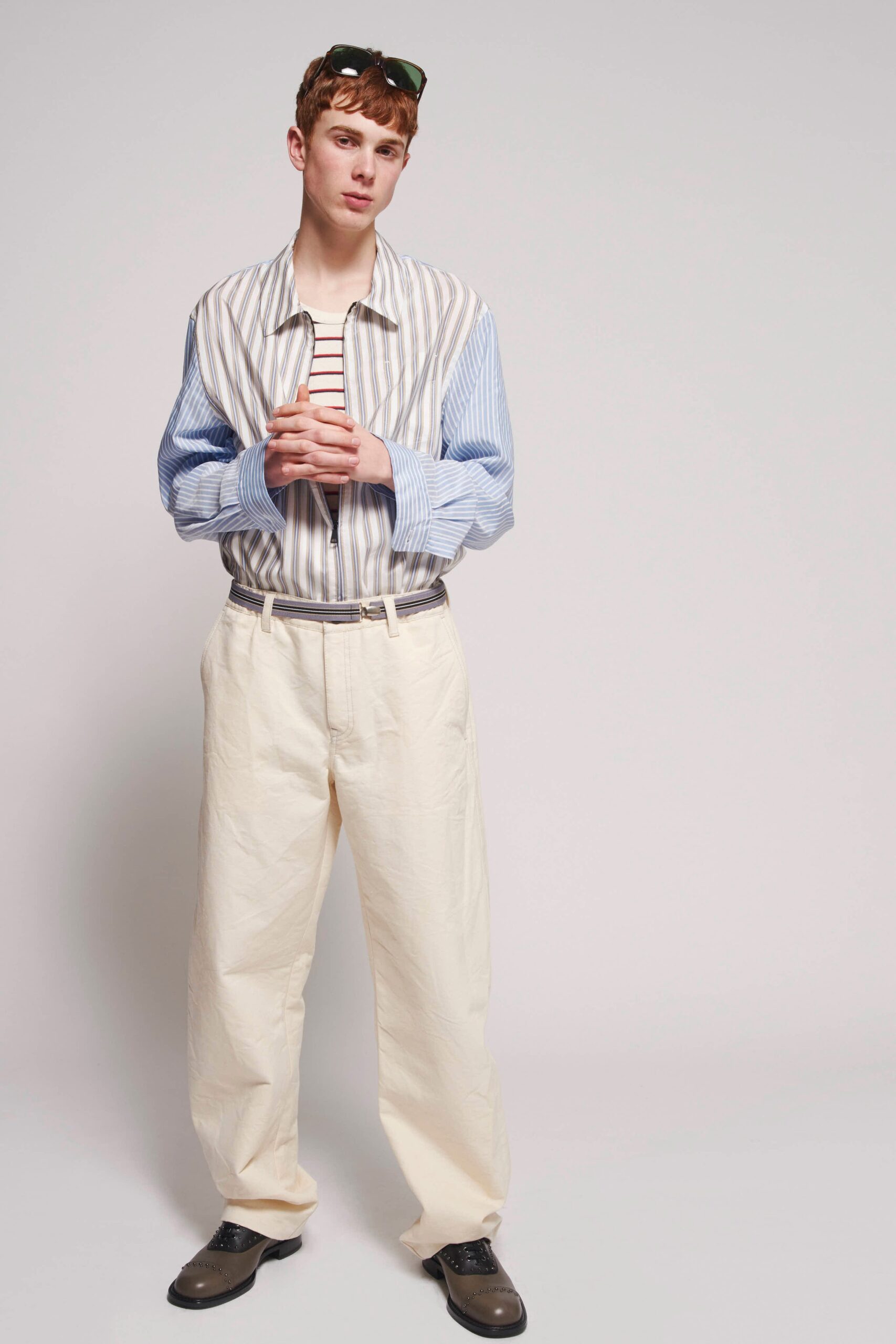 relaxed striped shirt and beige pants