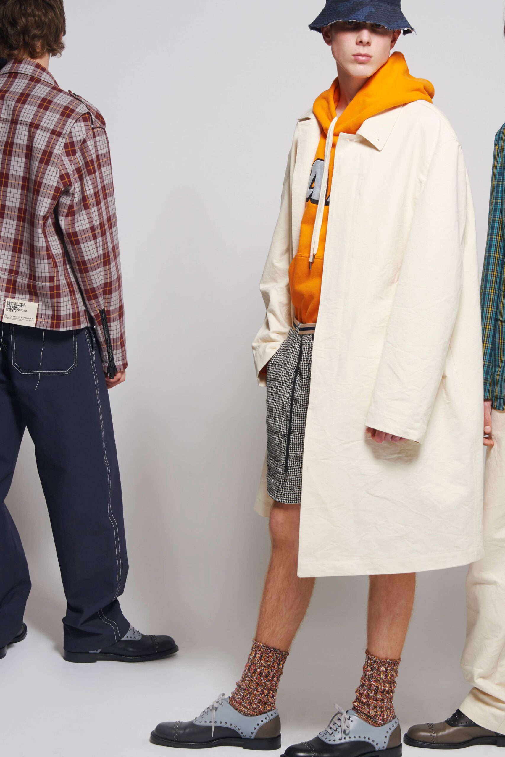 white coat with orange hoodie