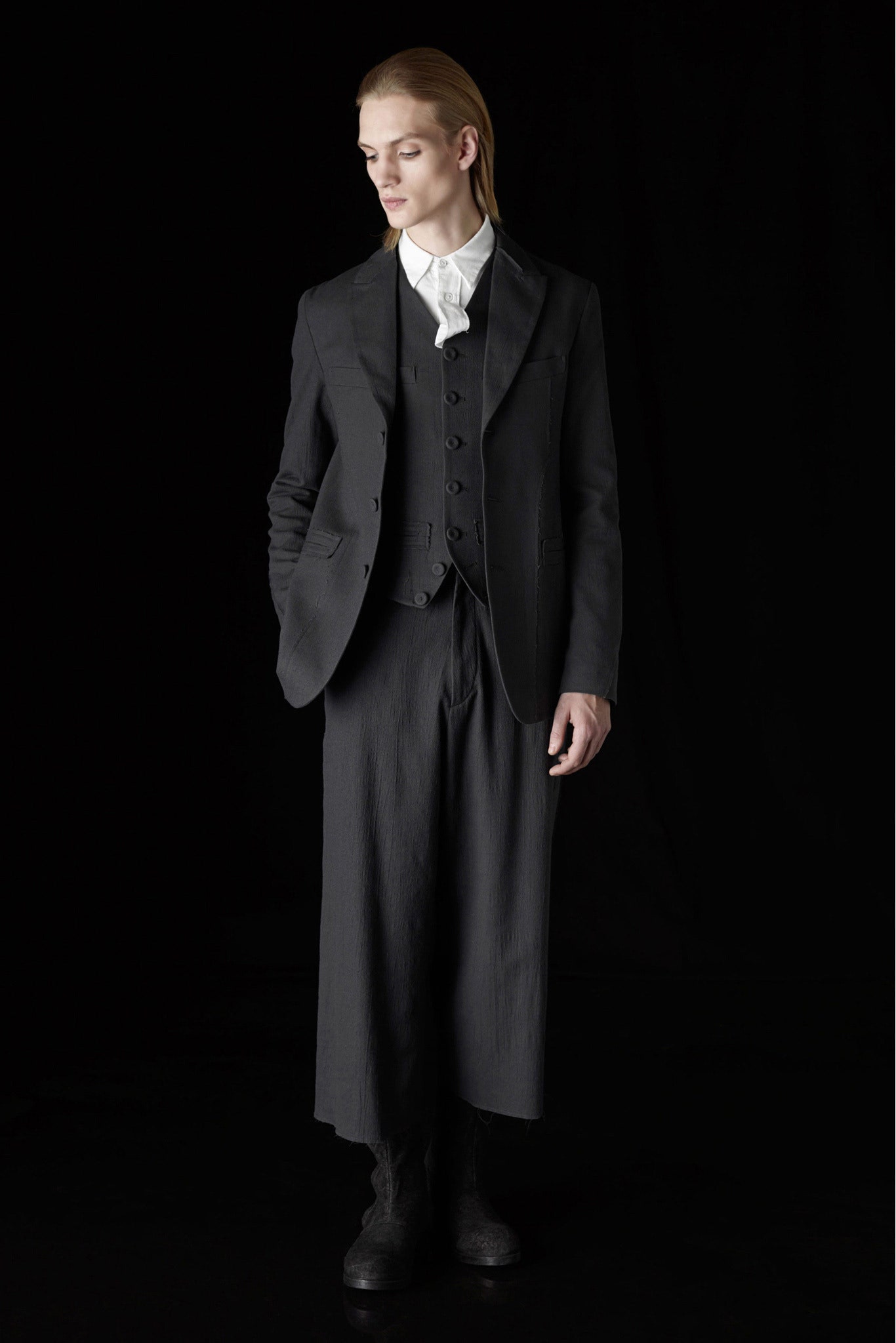 black tailored suit with white shirt