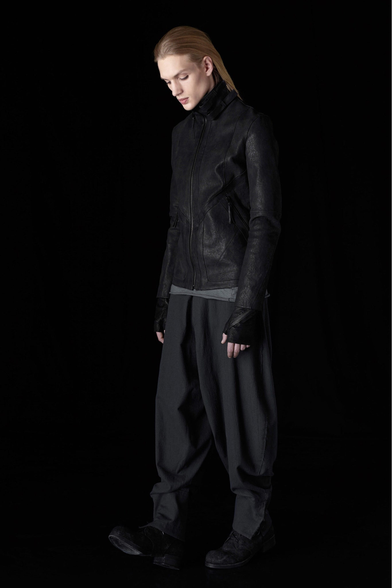 black leather fitted jacket and relaxed pants