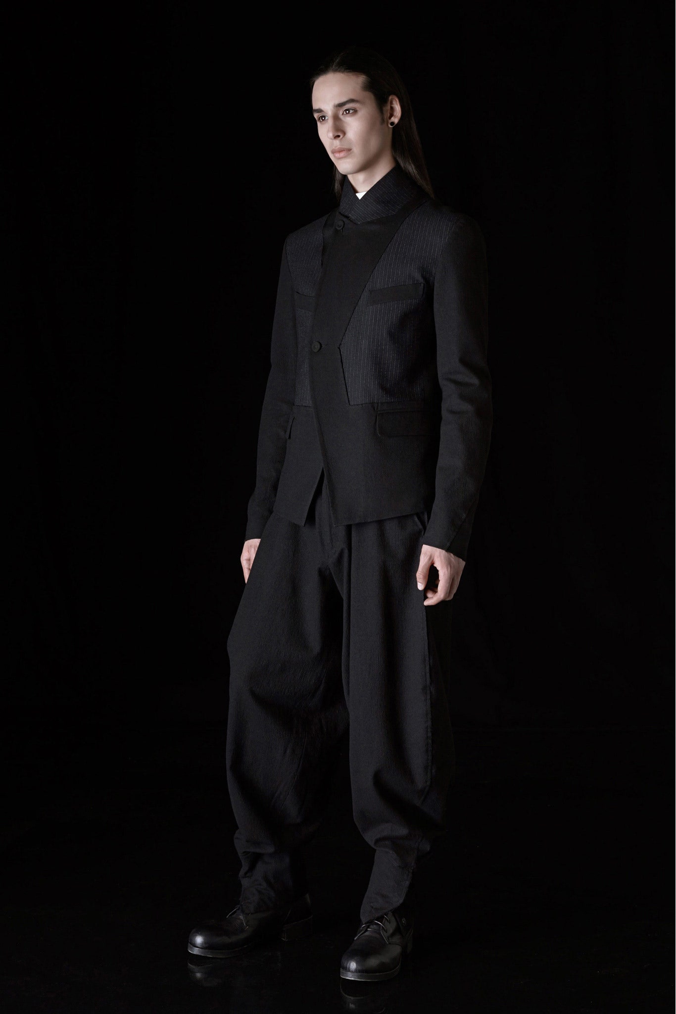 black tailored blazer and relaxed pants