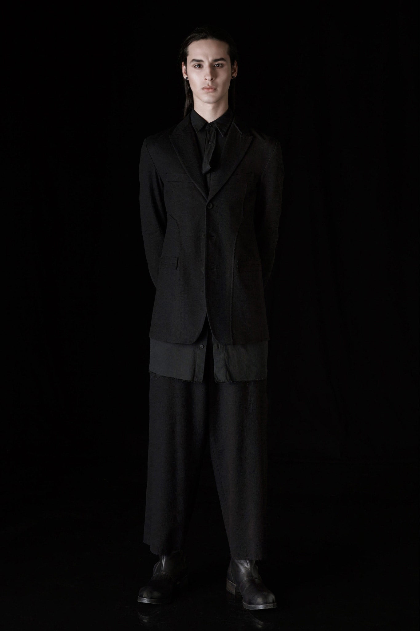 black tailored suit with relaxed pants