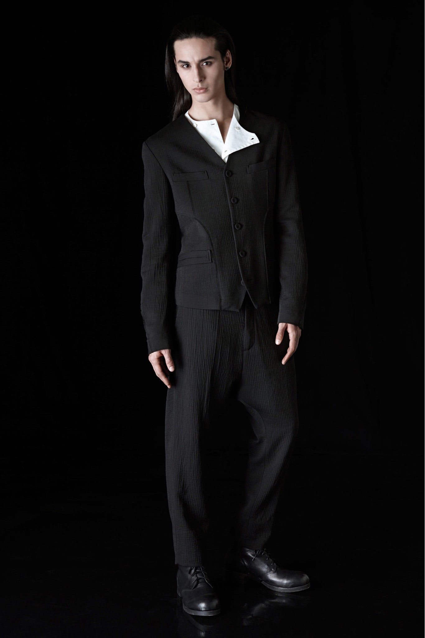 black tailored suit with relaxed pants