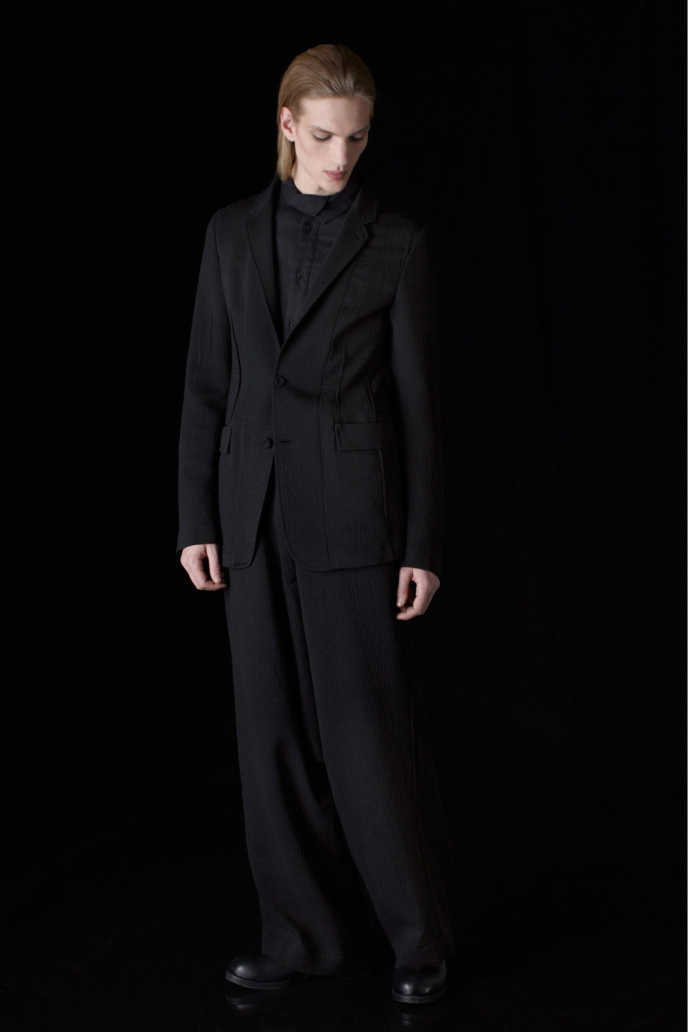 black tailored wool suit