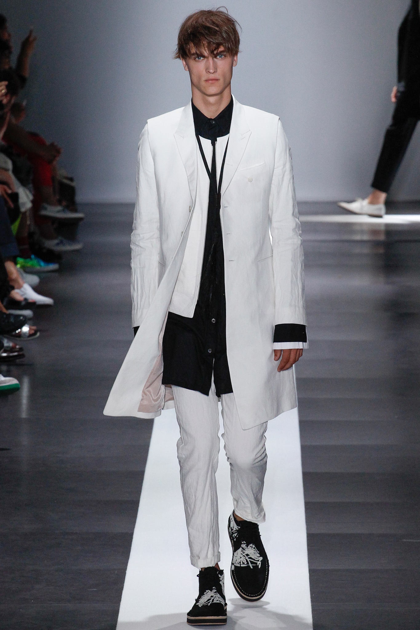 white tailored coat with black shirt
