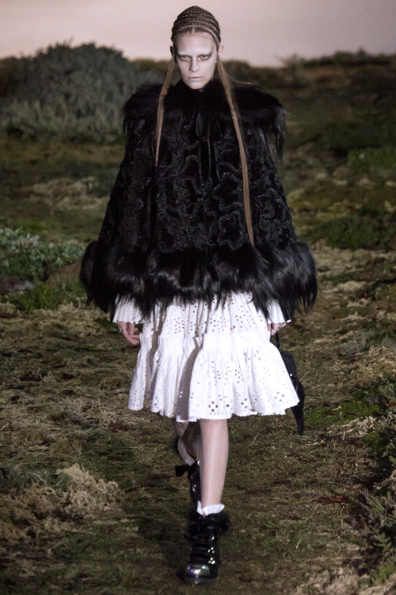 black fur cape and white dress