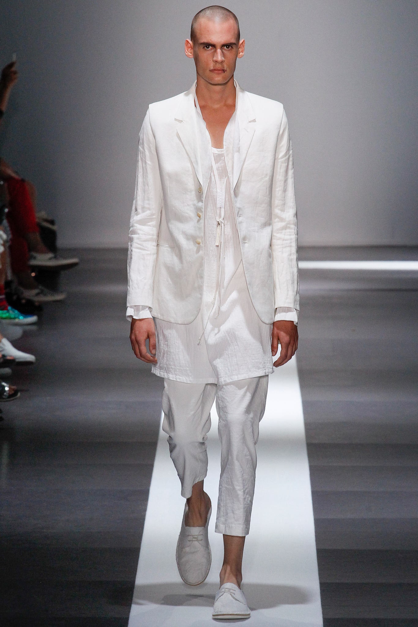 white tailored suit with relaxed shirt