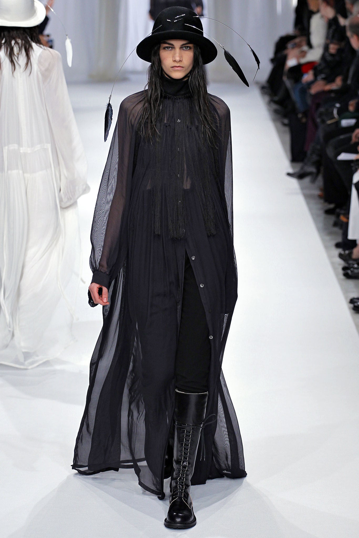 black flowing maxi dress with boots