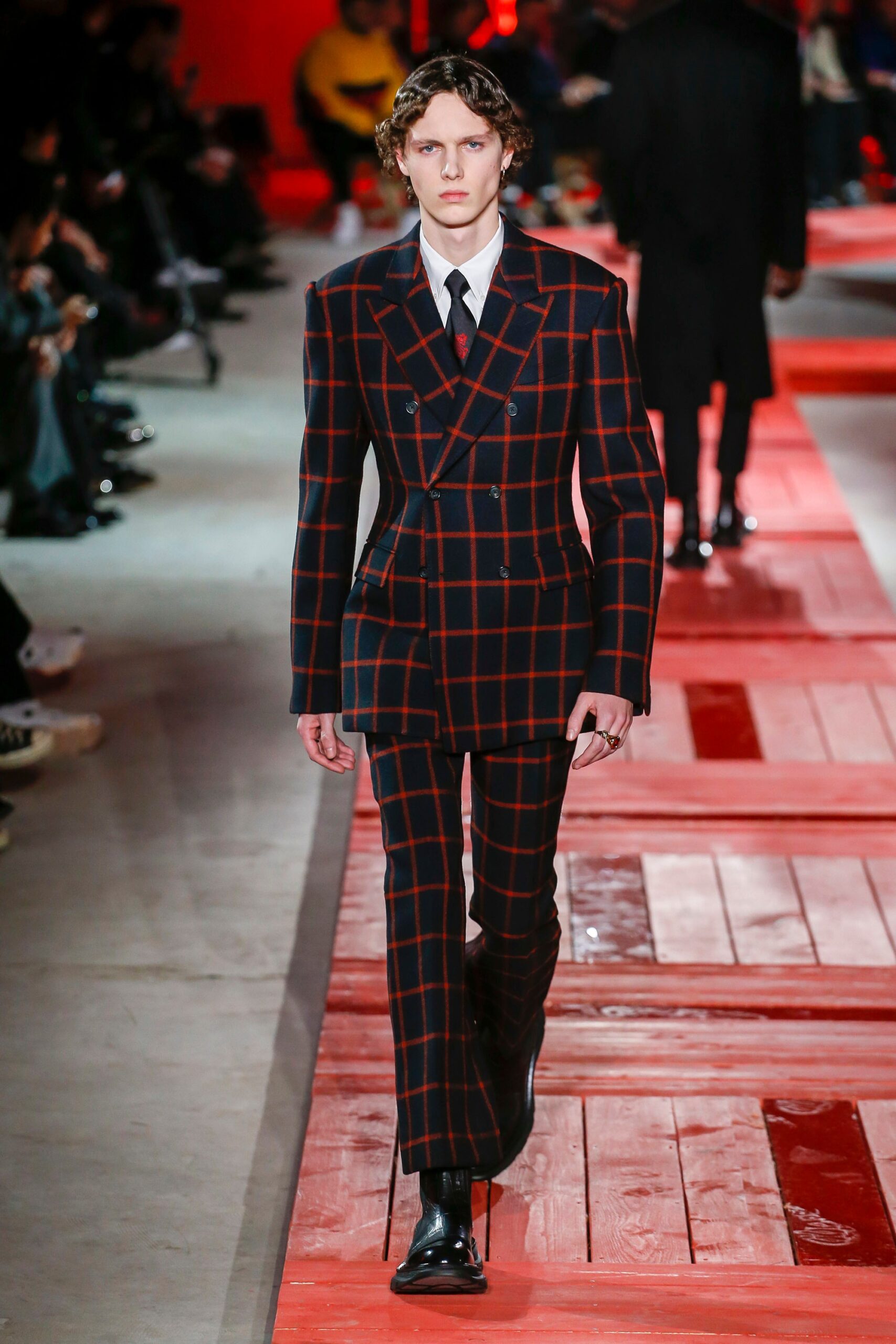tailored black and red checked suit