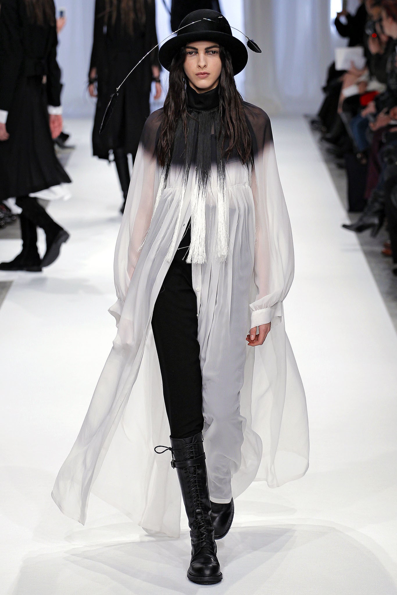 black and white flowing coat