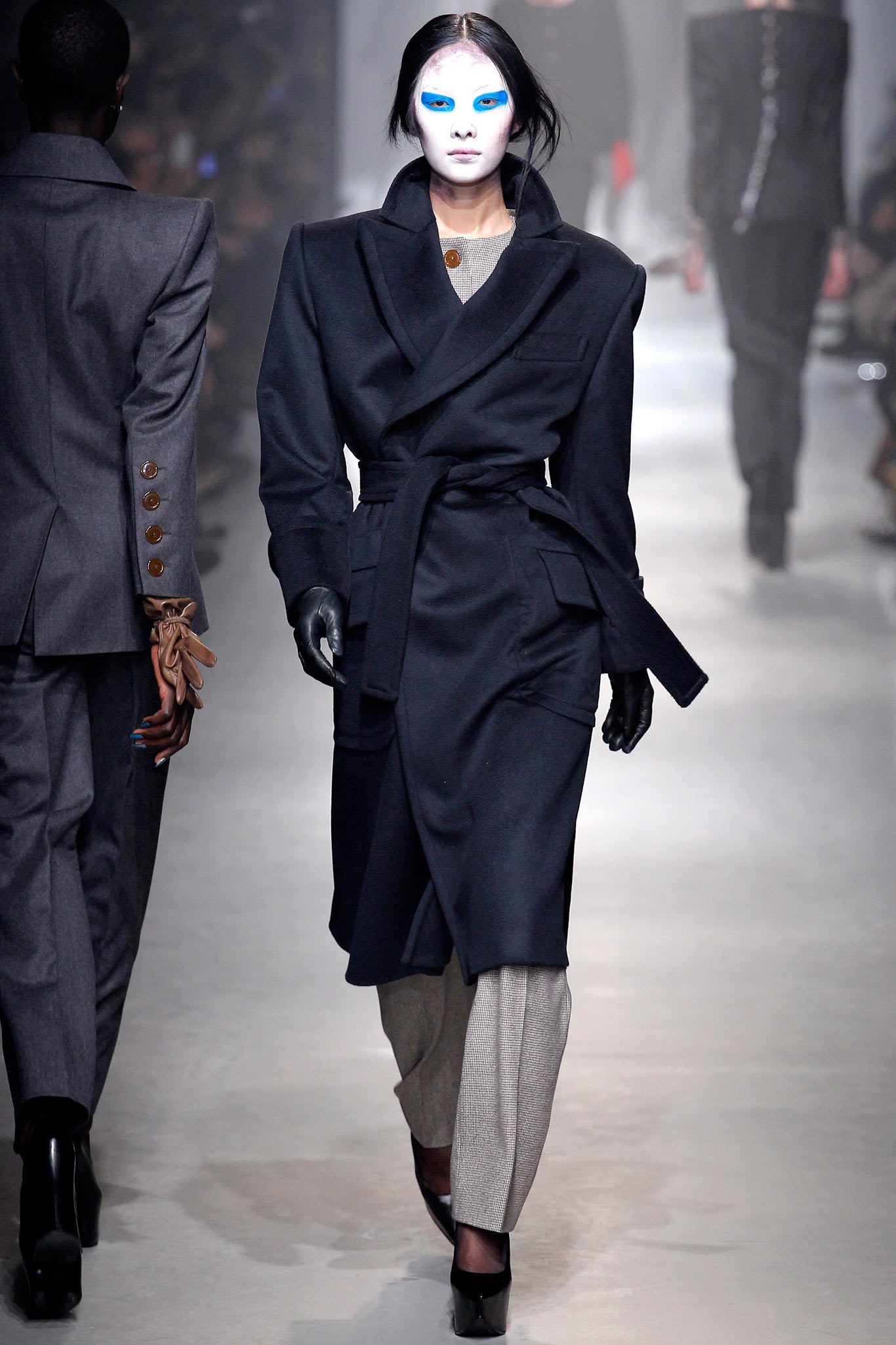 black wool coat with gray pants