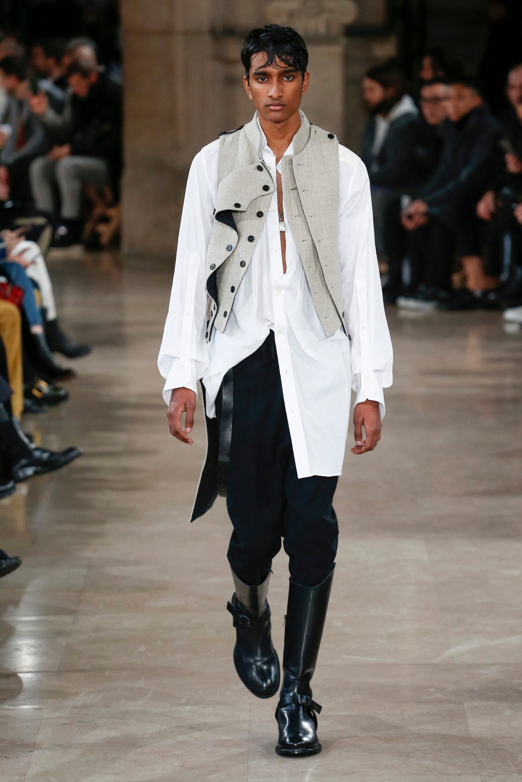 white shirt gray vest black pants