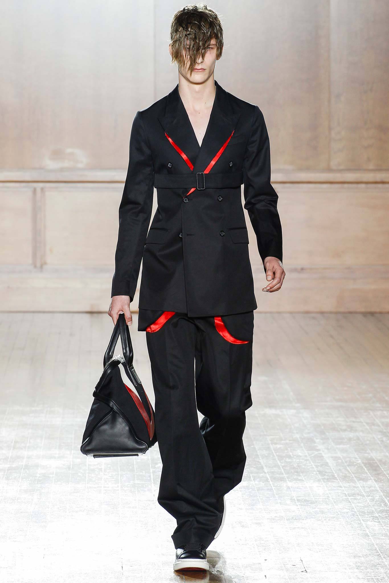 black tailored suit with bag