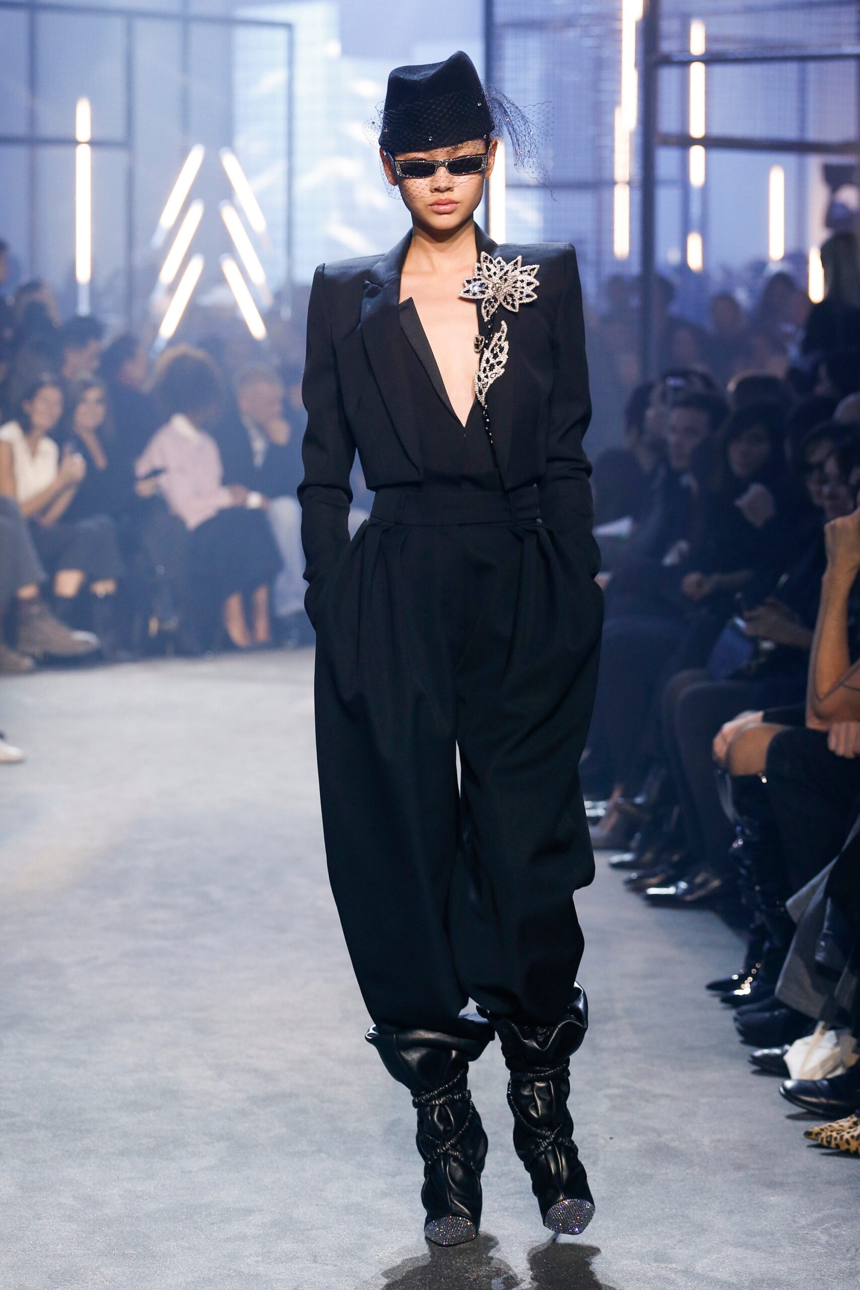 black tailored suit with relaxed pants