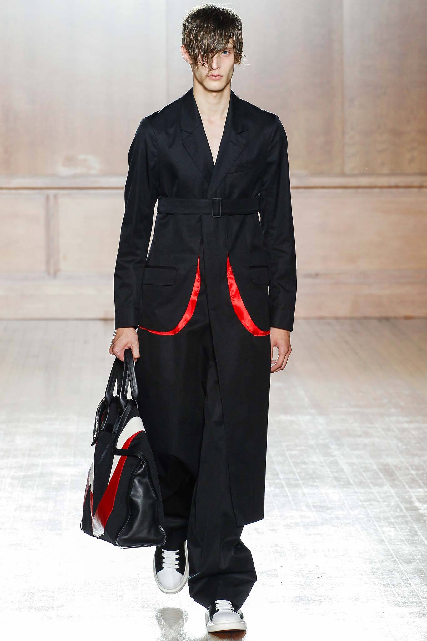 black coat with relaxed pants