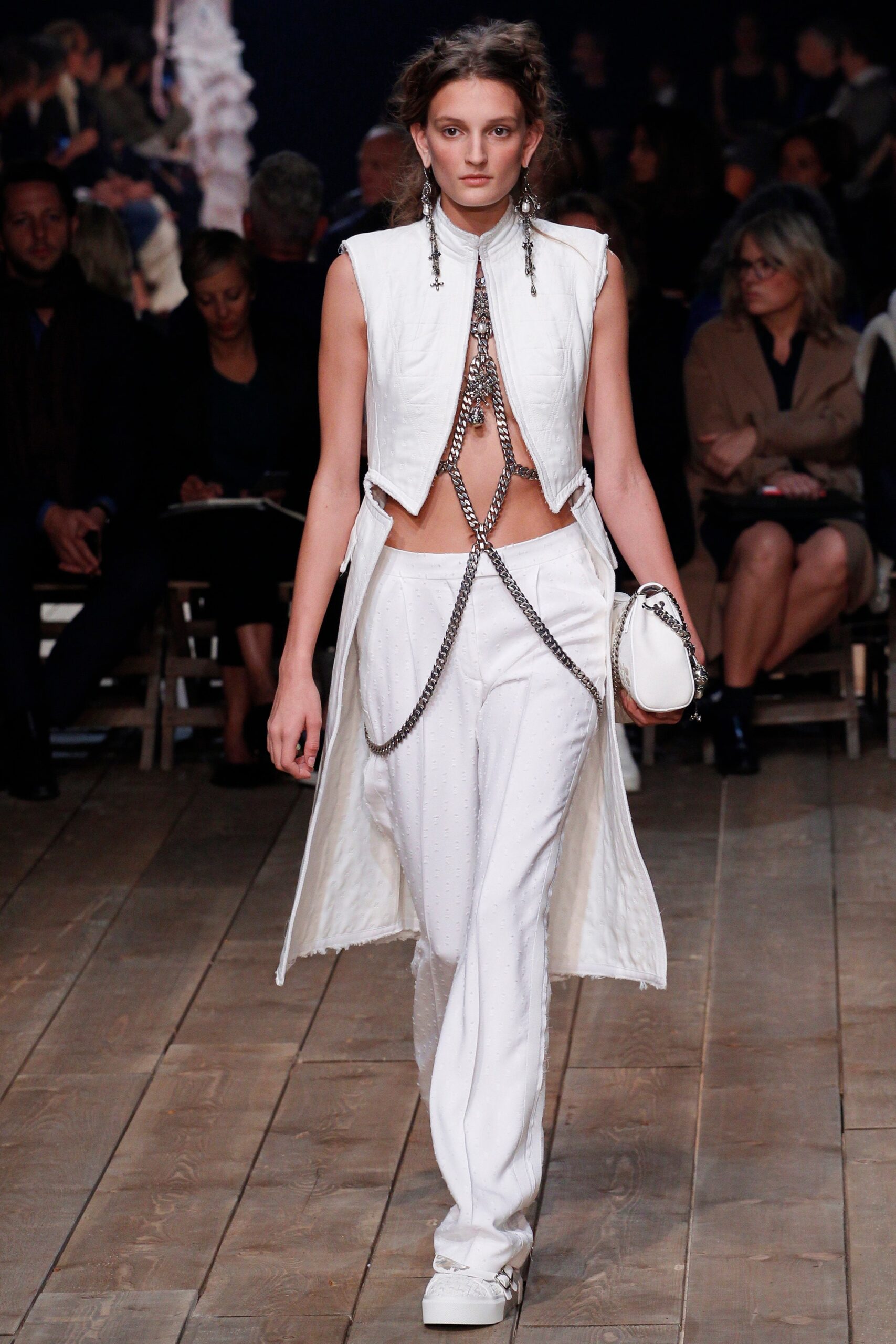 white silk sleeveless collared fitted draped jacket