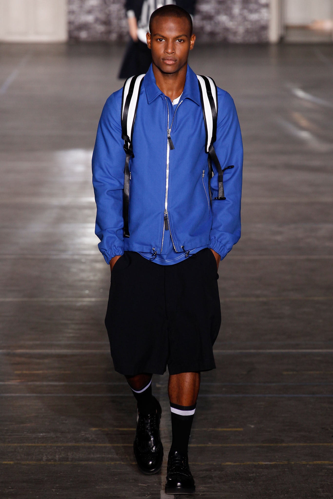 blue relaxed jacket with black shorts