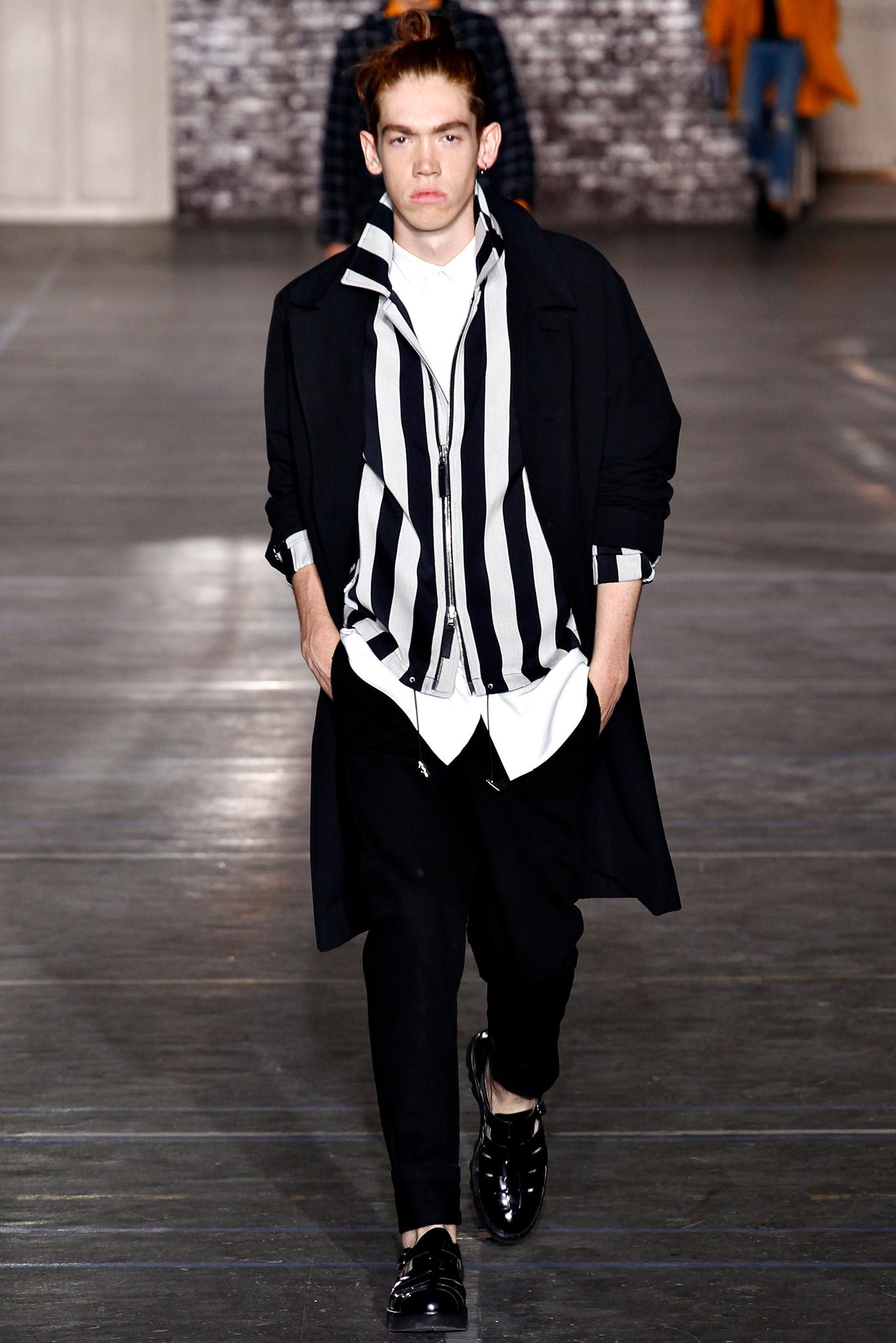 black coat with striped shirt