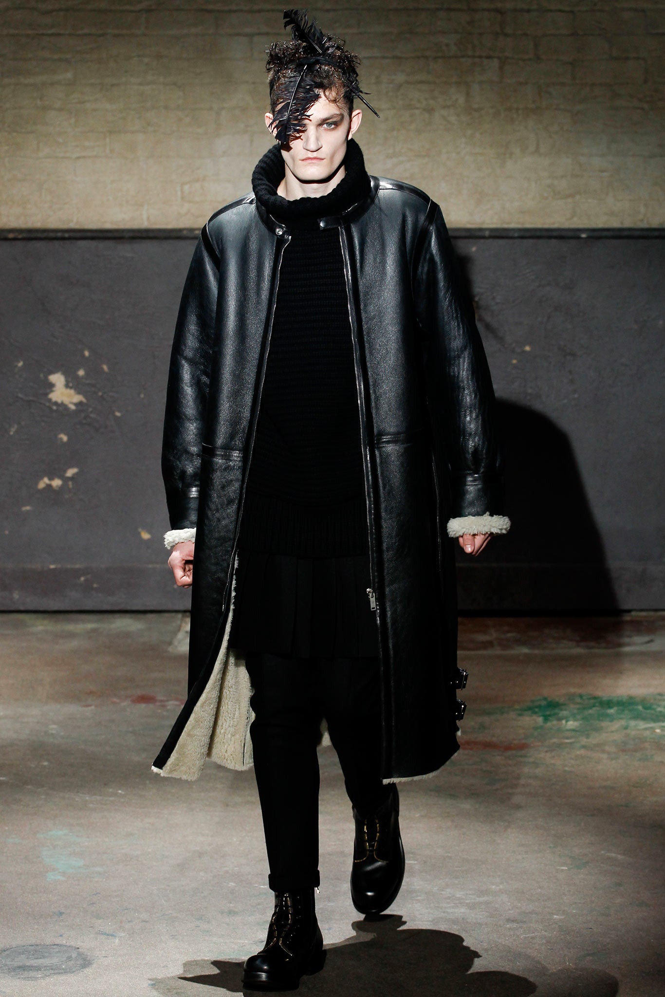 black leather coat with fitted sweater