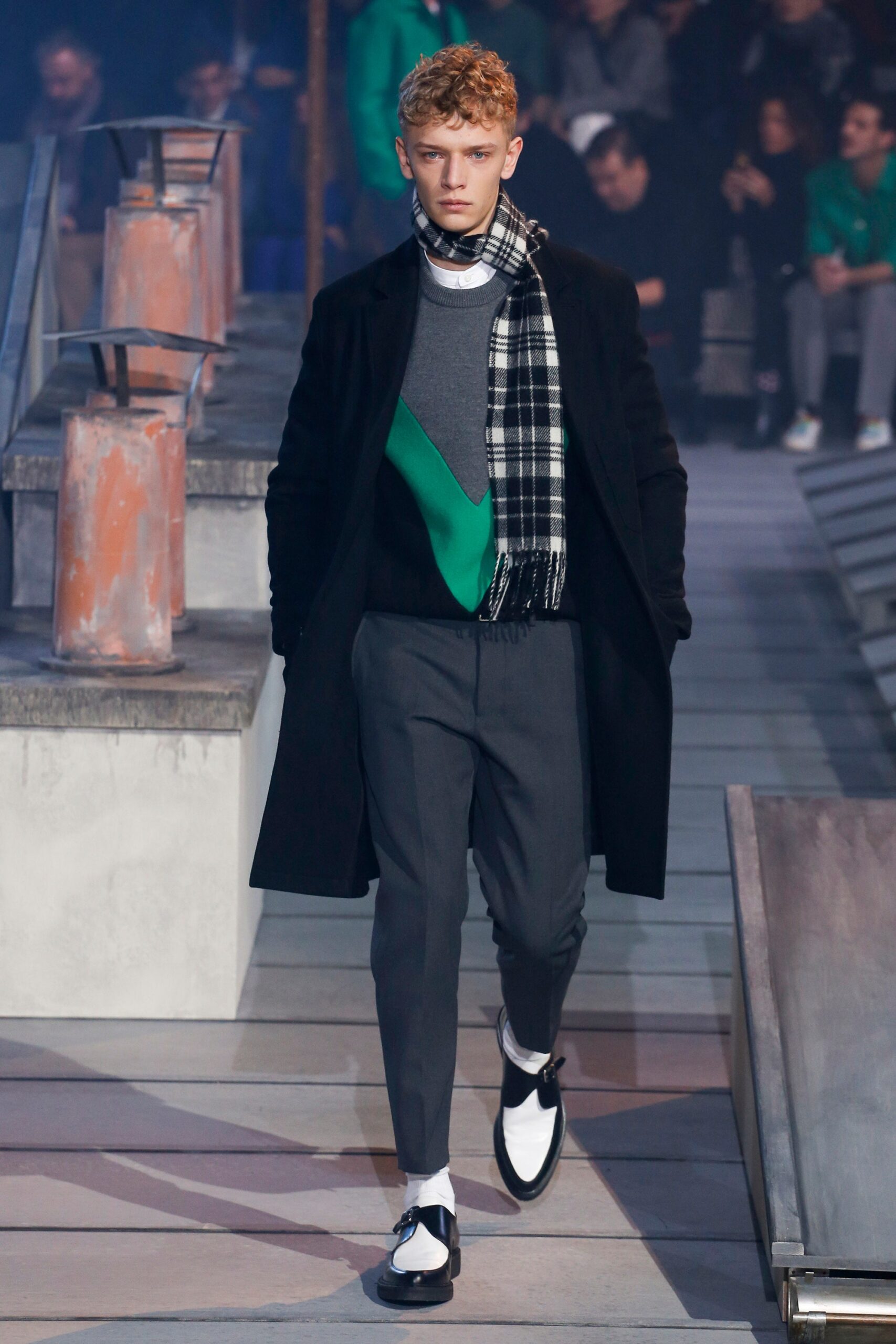 black coat gray sweater tailored pants