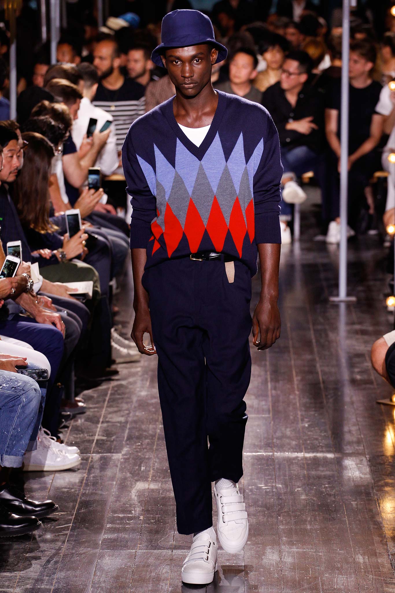 blue color-blocked sweater with tailored pants
