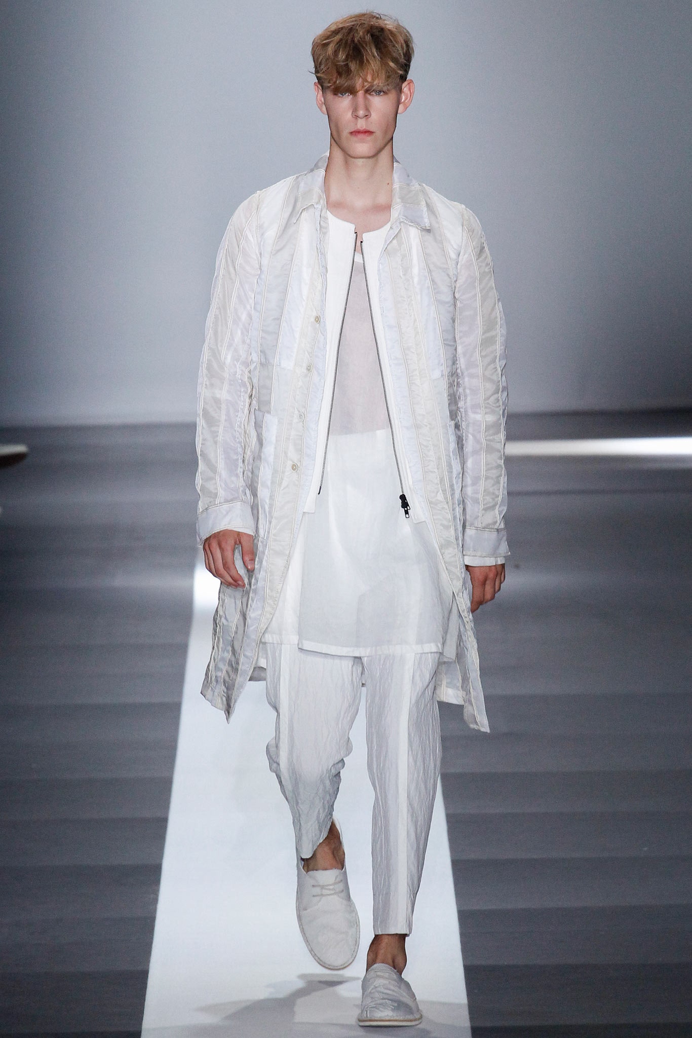 white relaxed coat with fitted shirt