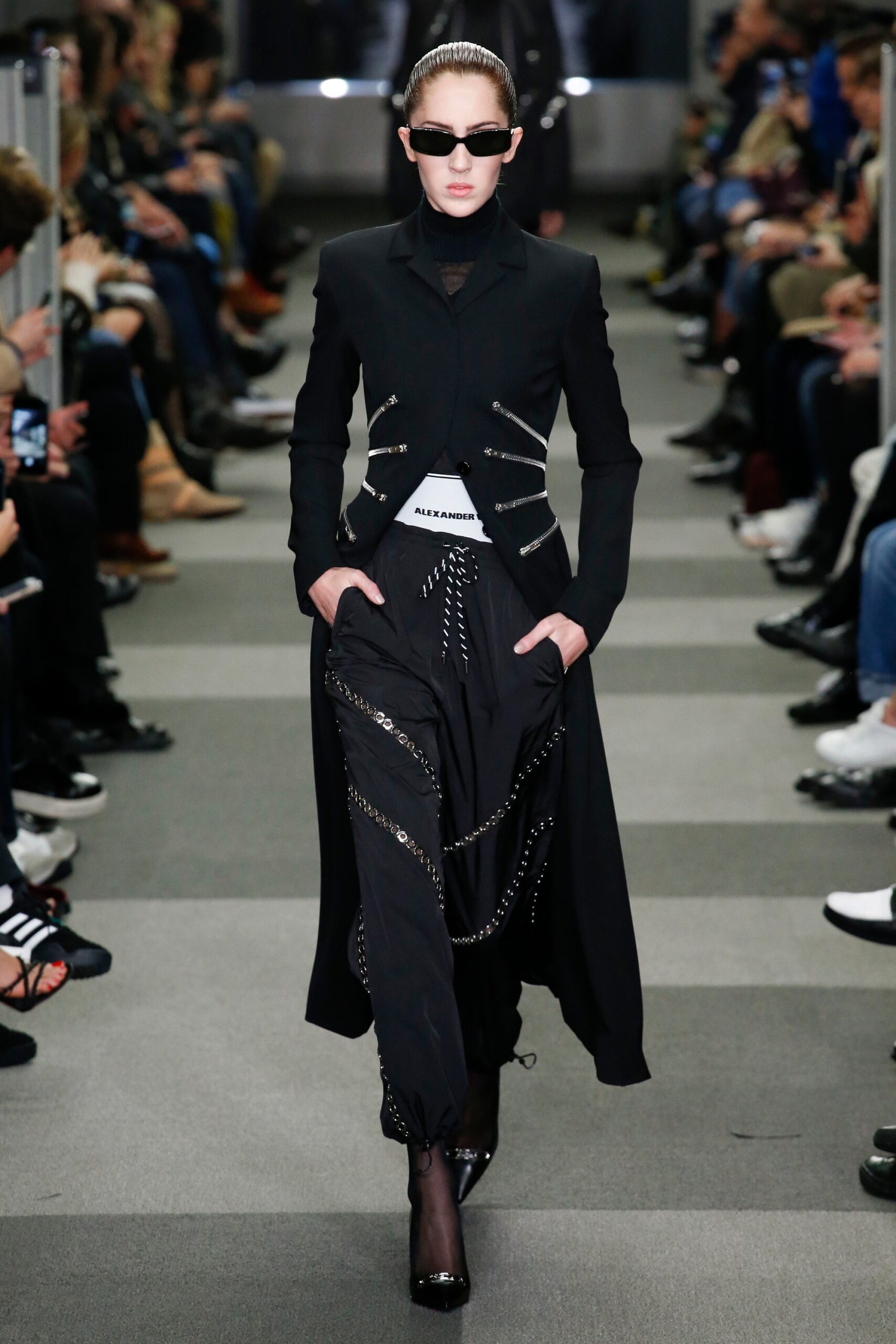 black fitted coat with wide-leg pants
