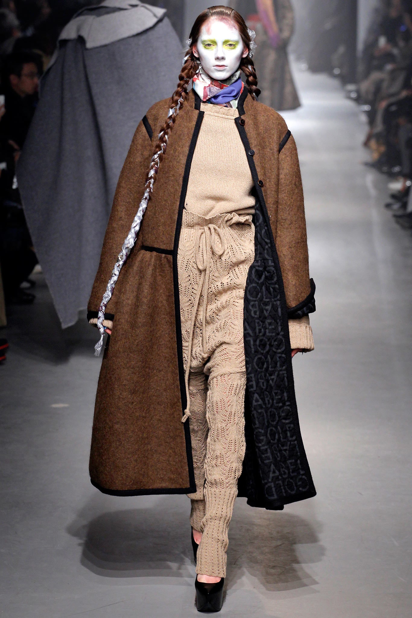 brown wool coat and beige jumpsuit