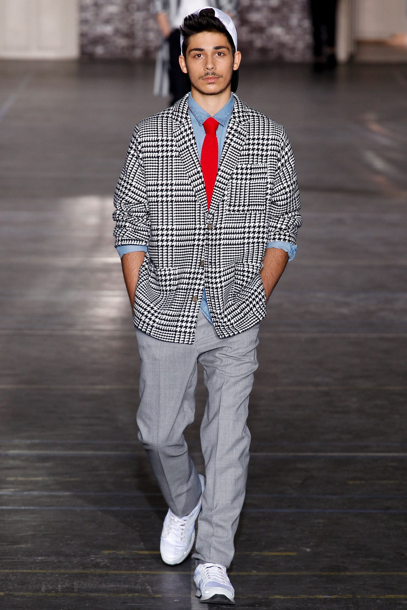 checked blazer with gray pants