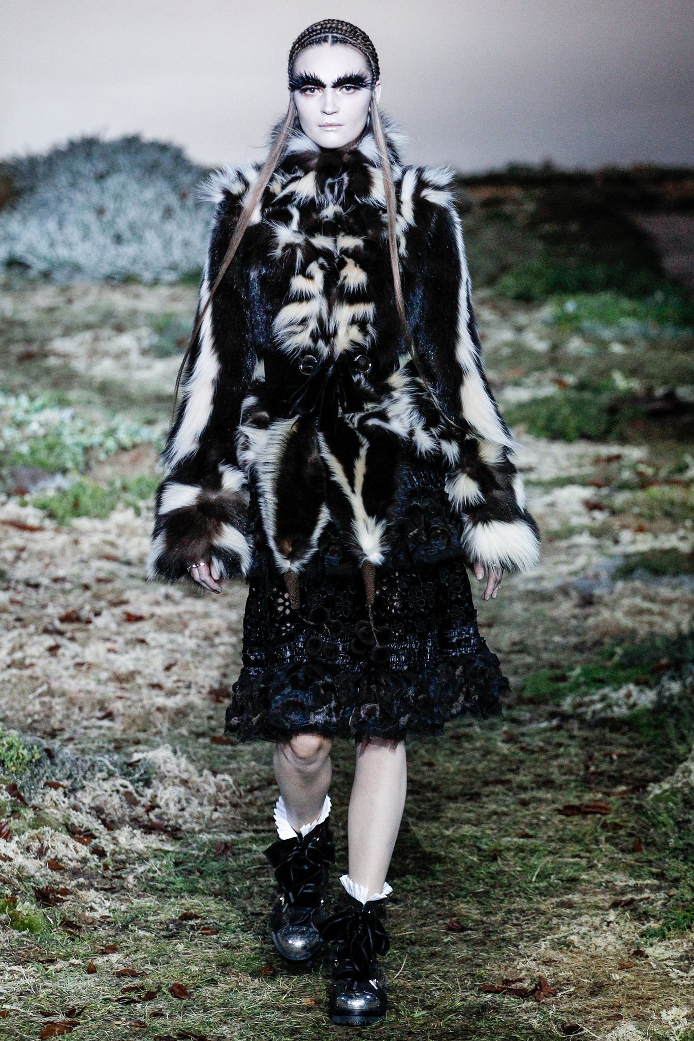 black and white fur coat with lace dress