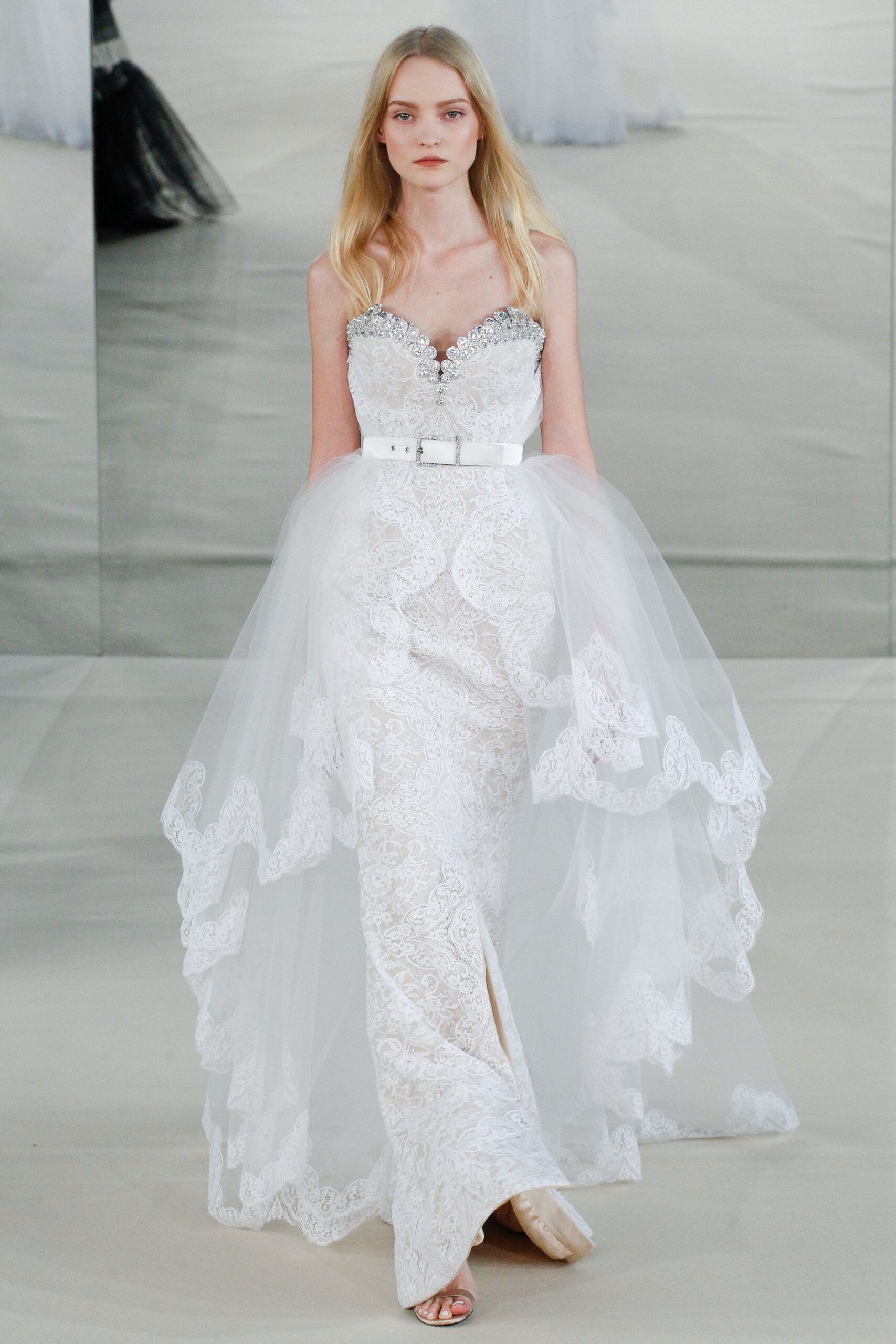 white lace sleeveless gown