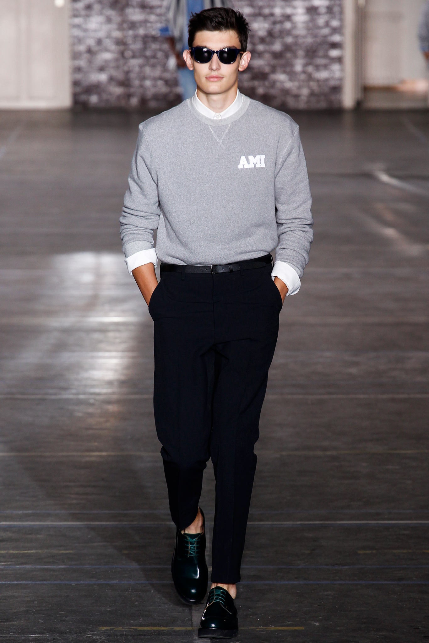 gray relaxed sweater and black tailored pants