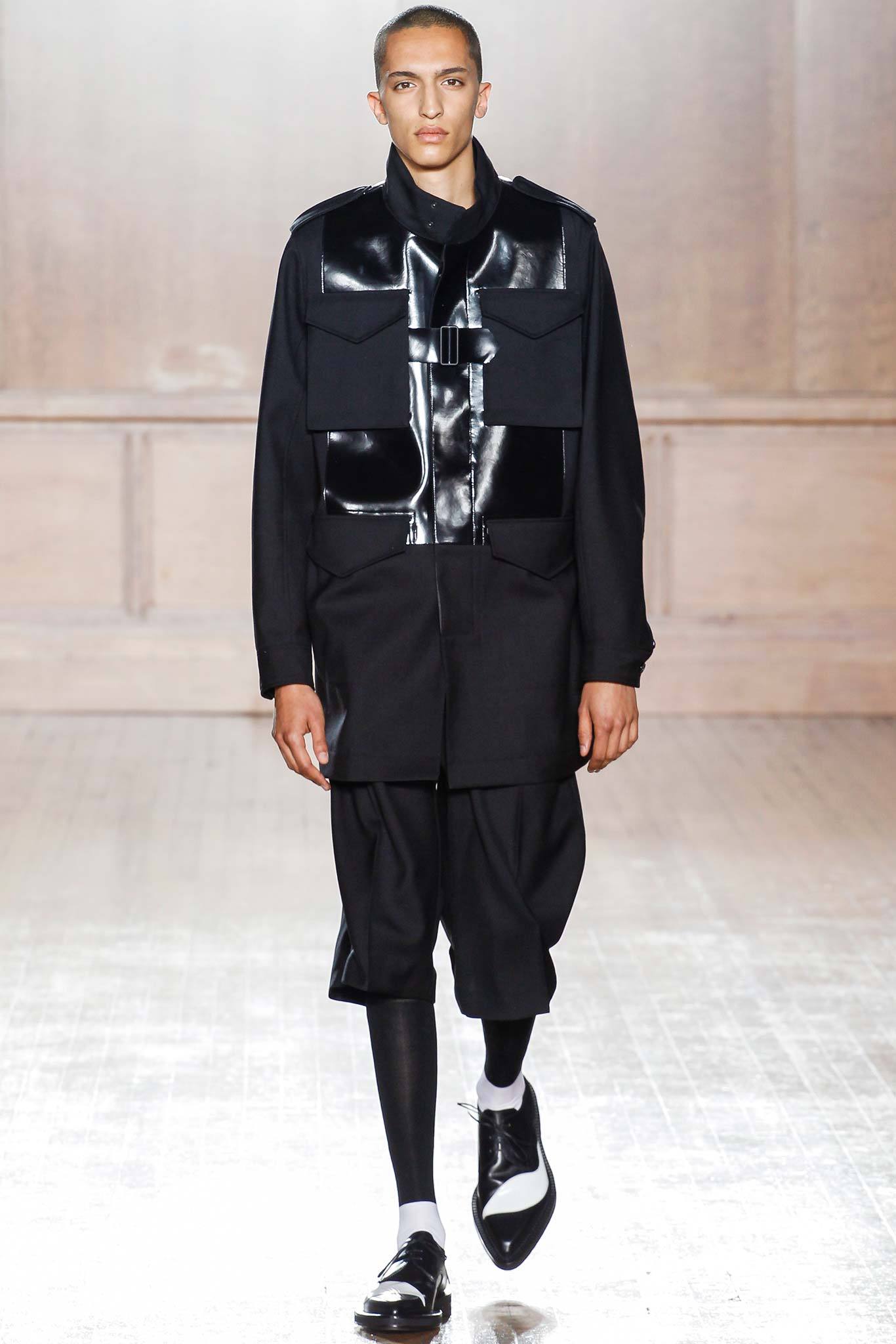 black vinyl jacket with wide-leg pants