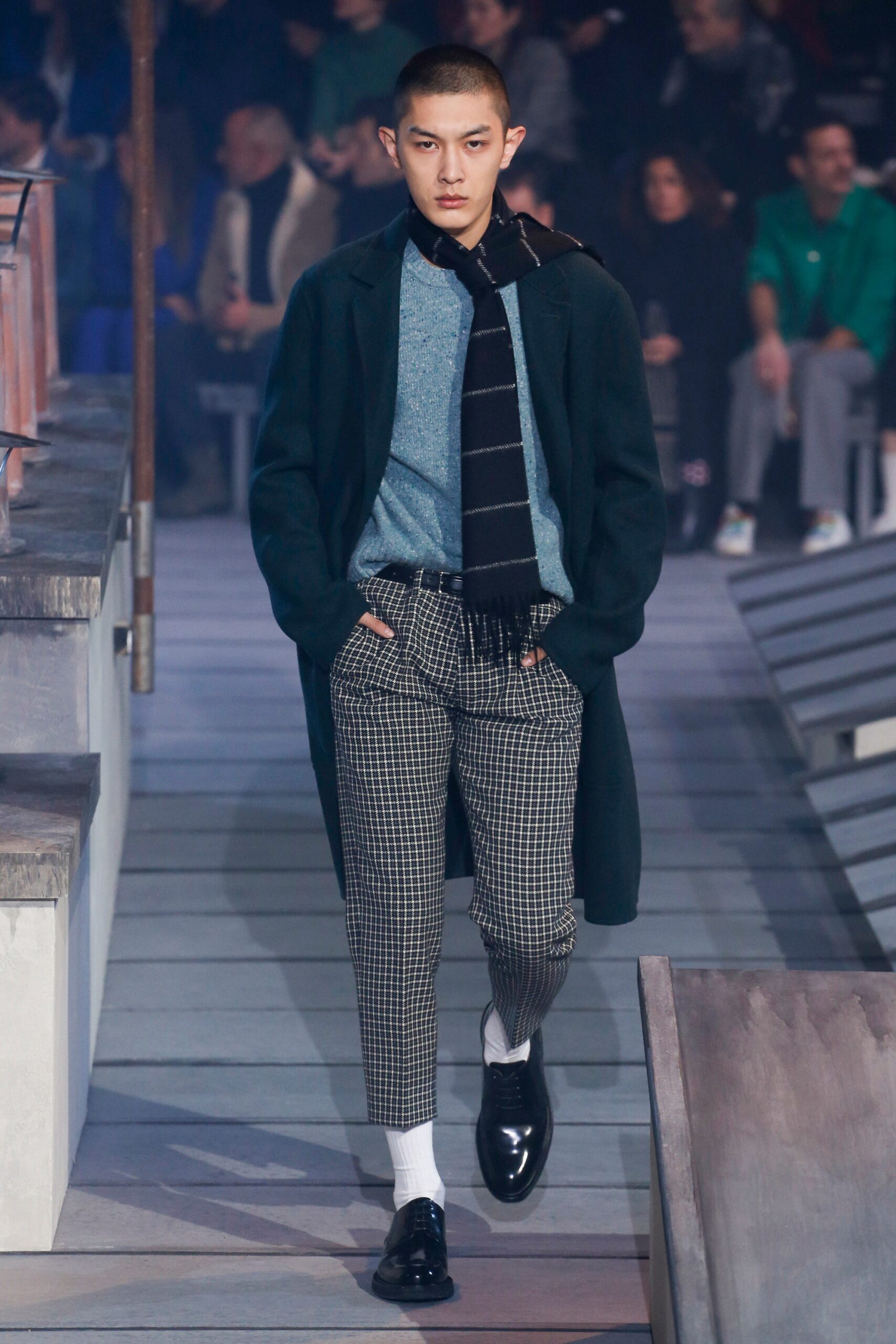 black wool coat with blue sweater